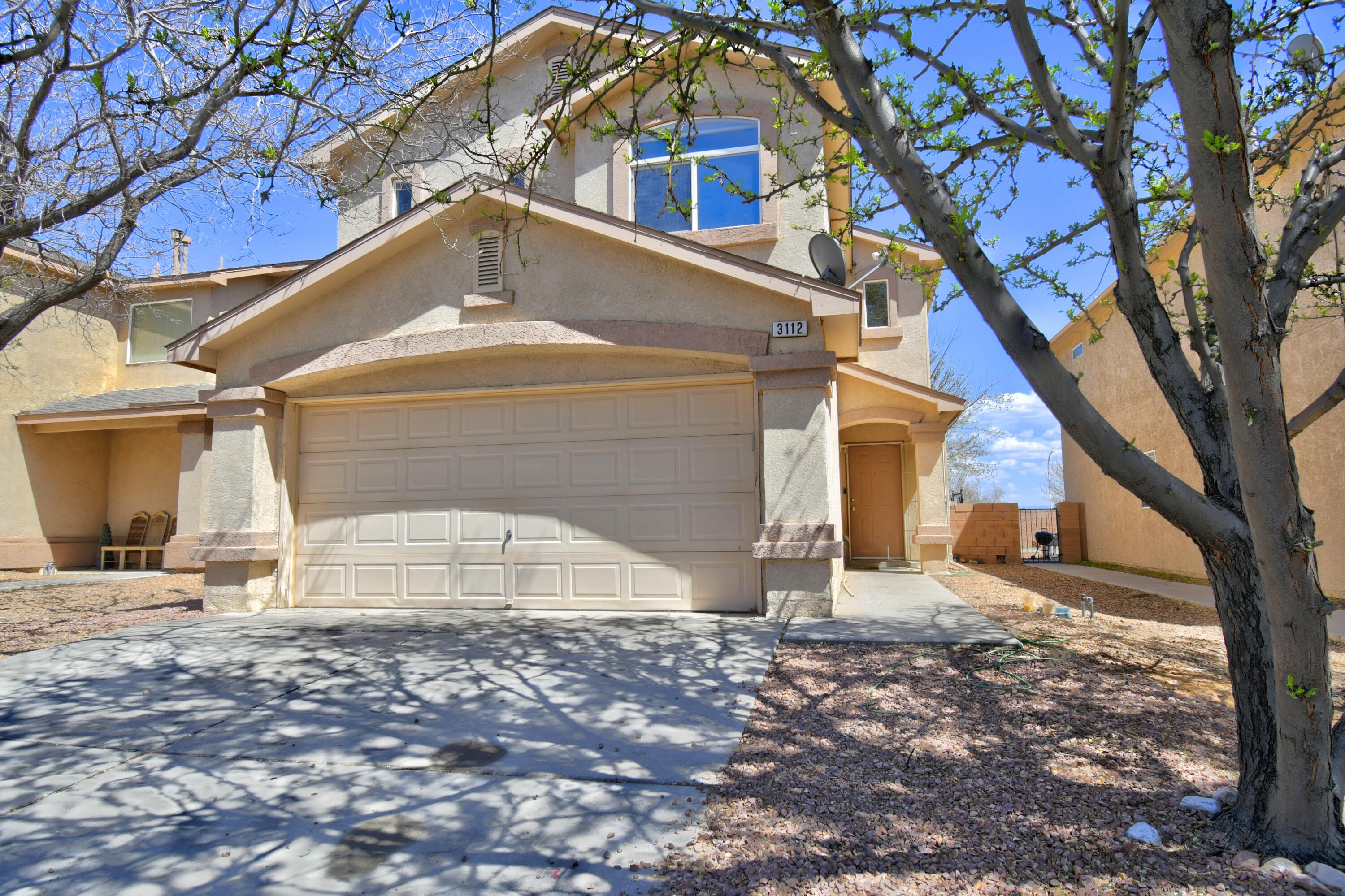 Beautiful two story house in a gated community on the west side of town.The downstairs has a great open floor plan and fireplace to host all your friends and family. The home features a large primary bedroom with a walk-in closet and large tub.  This home also has solar panels to help your electricity needs. Not only is this home right up the road from shopping and restaurants, but it's also right down the road from Atrisco Heritage High School. And the spacious backyard features fabulous views of the Sandias. Needless to say this home is in a great location. Come see your new dream home today!