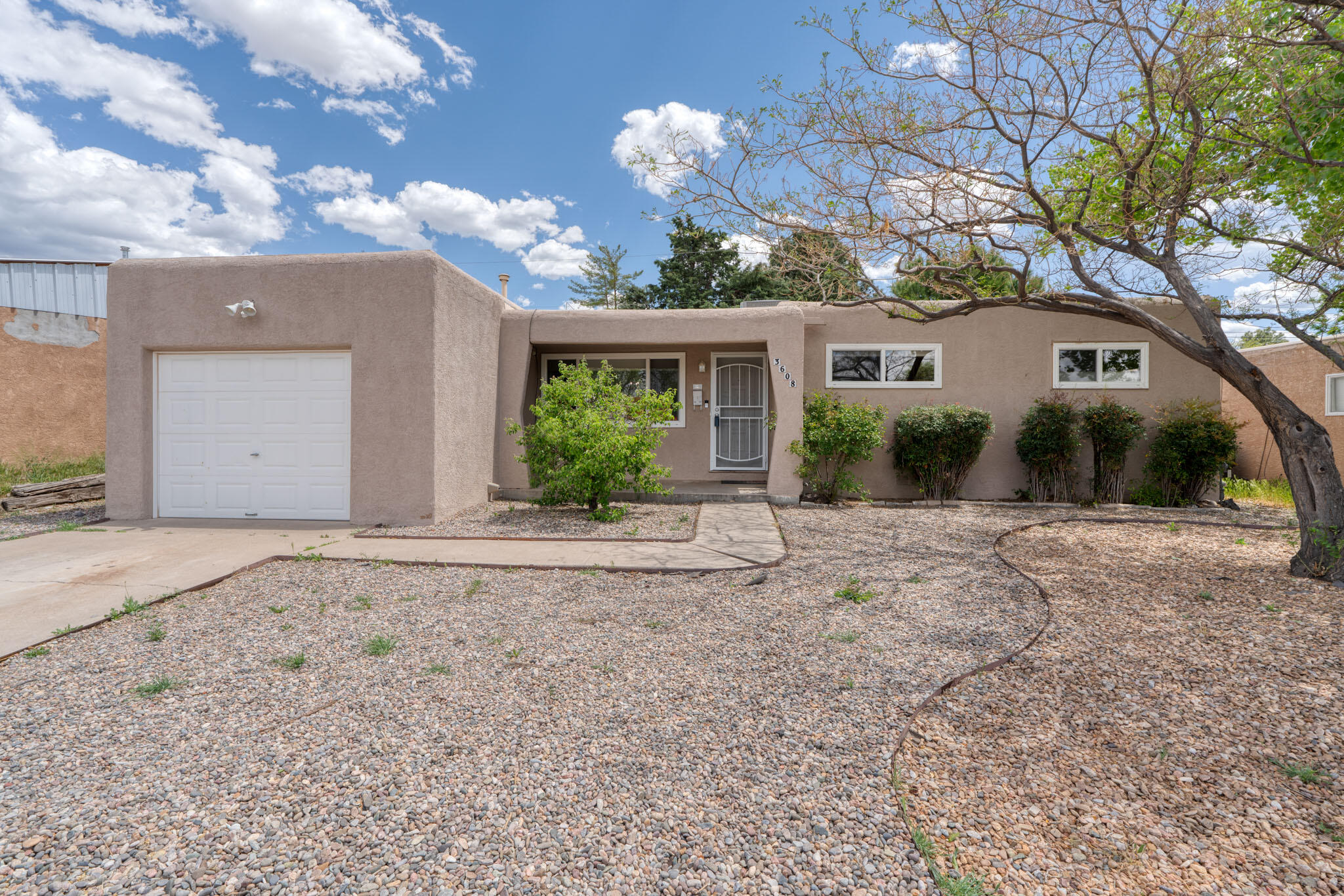 Hurry to this updated home in Eldorado's school district. Updated kitchen includes granite counters & stainless appliance suite. Tile and laminate thoughout main living spaces. Nice custom tiled wood burning fireplace. Both bathrooms are updated as well. Enjoy cool evenings in your private backyard enclosed by low maintenance block walls. Both front & back include easy care xeriscape. All of thisplus REFRIGERATED cooling and a nearly new TPO roof (2021). This cutie will not be available for long, don't delay.