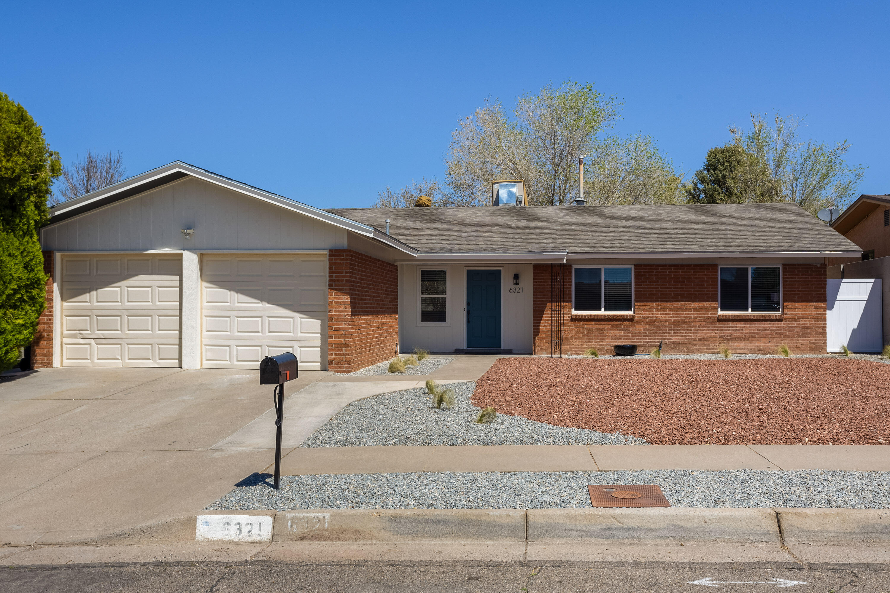 Nestled in Albuquerque's Northeast Heights, this 4-bed, 2-bath haven boasts a new roof, updated bathrooms, granite counters in kitchen and updated custom fireplace. New paint in every room and freshly cleaned carpets make this home move in ready for its new owners!  Backyard features a large covered patio with privacy walls making it the perfect place for relaxation or entertainment.