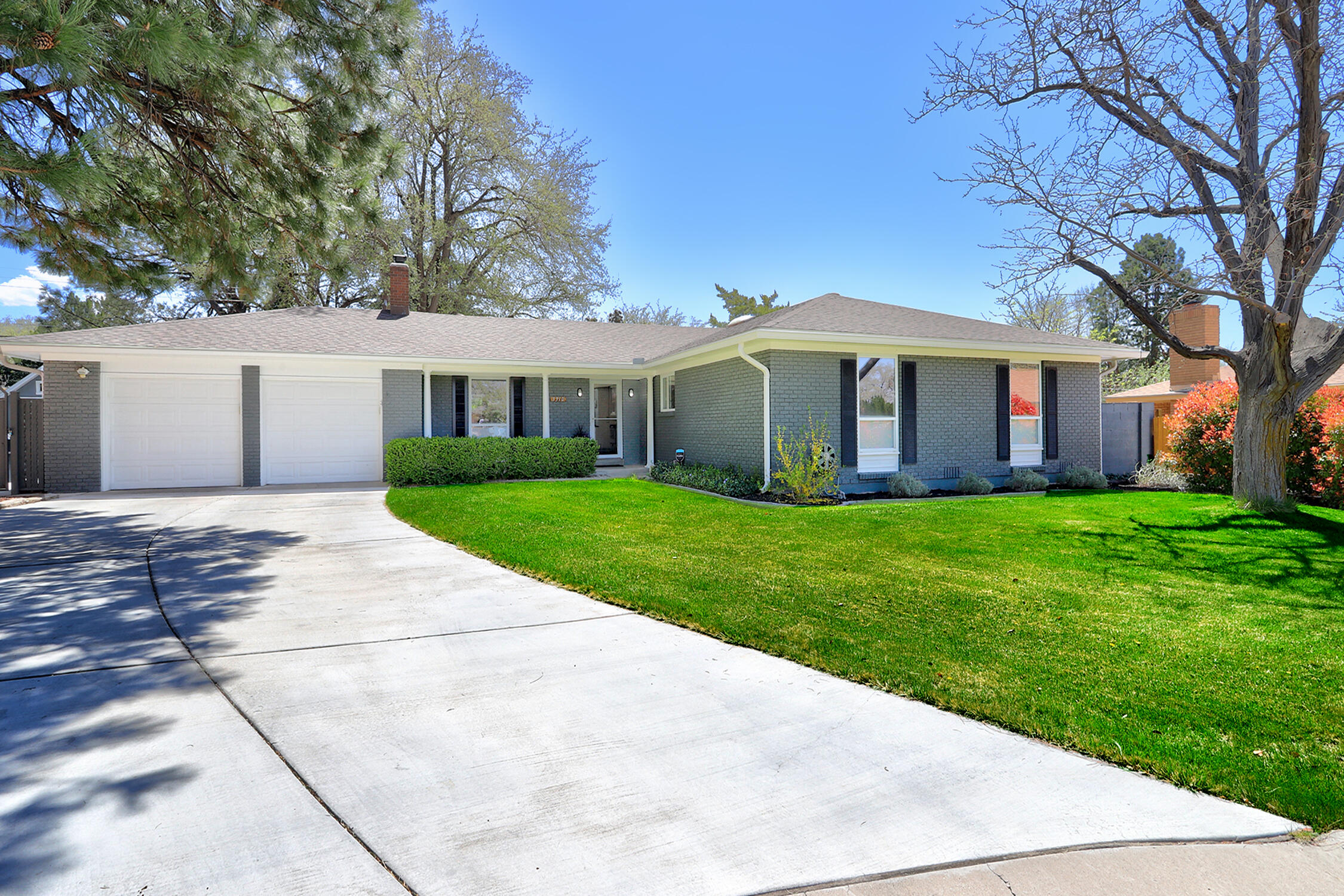 Beautifully updated ranch home on an oversized, cul-de-sac lot in desirable uptown. Open concept living, dining, & kitchen w/fireplace & skylight for ambient lighting day & night. Gorgeous, custom bathrooms w/mitered shower glass, vanities, & architectural features. If you love Magnolia style, this home is heaven! Primary suite features brick wall, shiplap, vaulted & beamed ceiling, sitting area, ensuite bath, & windows to die for! Kitchen offers eat-in island, custom tile backsplash, pendant lighting, stainless appliance suite, ample cabinet & counter space. Custom window treatments convey. Built-ins & flex spaces thru-out. The backyard is a true retreat, complete w/pool, covered, screened patio, raised garden beds, mature trees, manageable lawn, storage, & fully secured for fur buddies