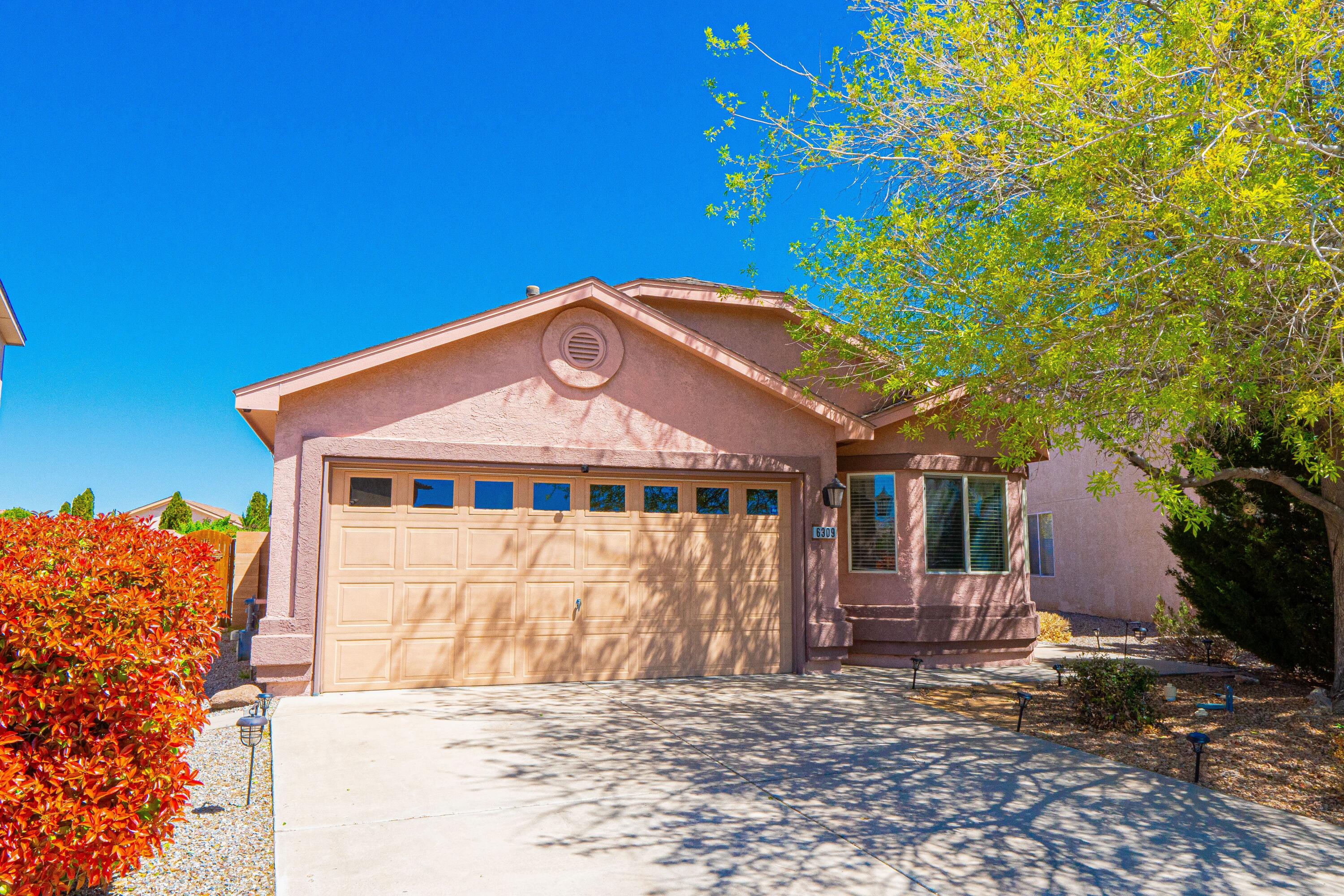 Welcome to this stunning home nestled in a serene double cul-de-sac! Step inside to discover cherry custom cabinets complemented by solid surface Corian countertops, vaulted ceilings, and elegant arches, creating a captivating ambiance throughout. Enjoy the tranquility of the park-like backyard from the comfort of your protected patio. The flexible floorplan offers versatility, with options for a den, office, or potential 4th bedroom. Admire the thoughtful details, including niches and open areas above the kitchen cabinets, enhancing both style and functionality.