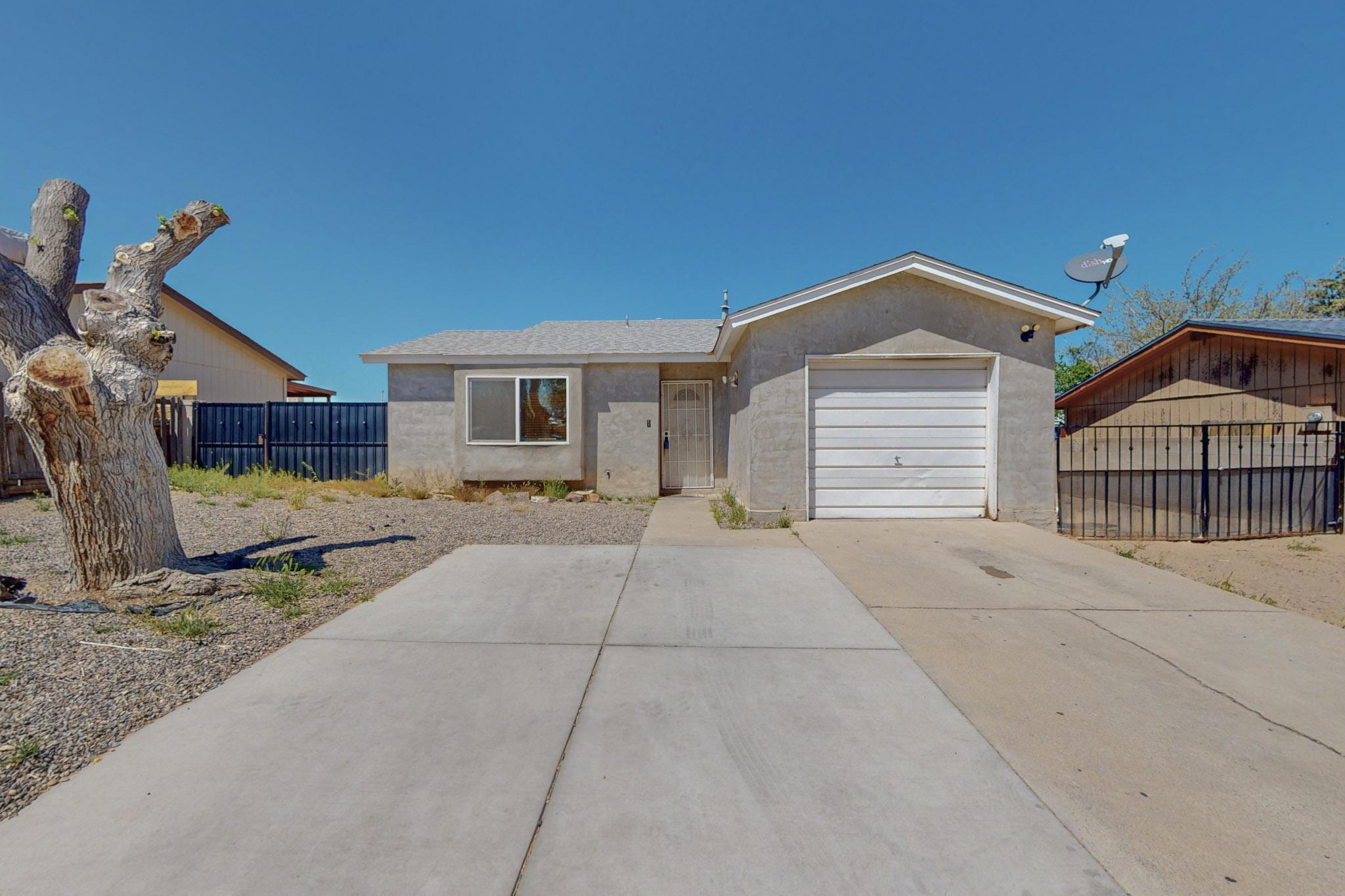 Great opportunity for home ownership! This home has backyard access and is close to shopping and schools.  Add your own personal touch to this beautiful opportunity. Being sold ''as is.''