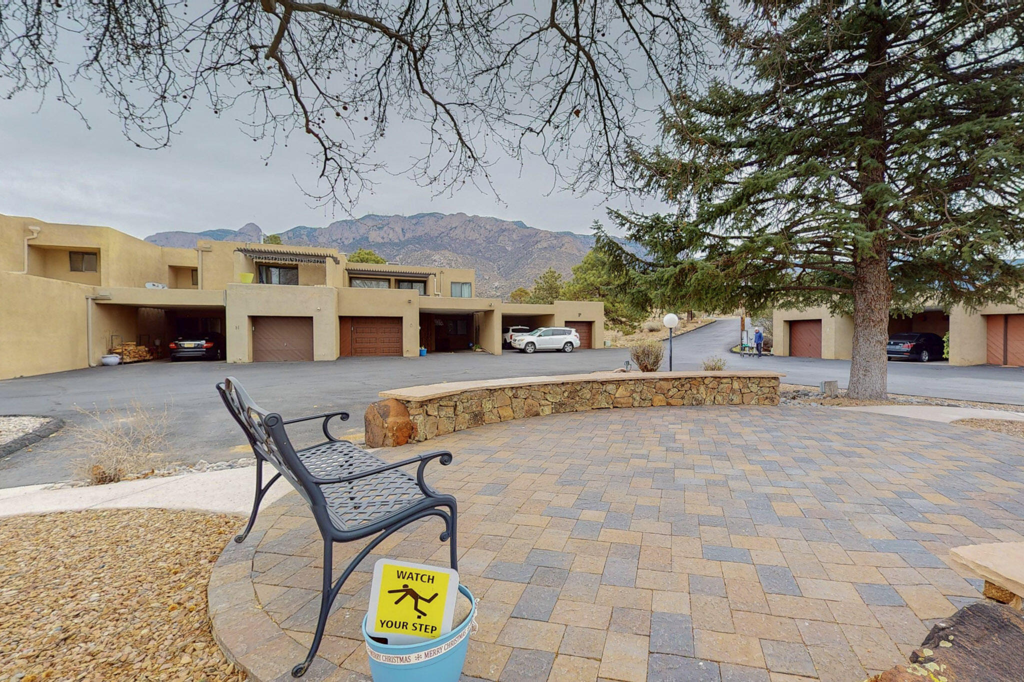 Views, views, views galore-Welcome to this gorgeous Sandia Heights end unit townhome featuring 3 bedrooms and 3 baths. very southwestern.  Beautiful spacious home. The floorplan is open and inviting. Very large front room, spacious primary bedroom, lovely kiva fireplace, two upstairs patio decks to enjoy the wonderful views, new carpets and paint, fenced patio downstairs off of the primary bedroom, wonderful hiking/biking trails. Lots of wildlife, This is a must see-Broker/owner