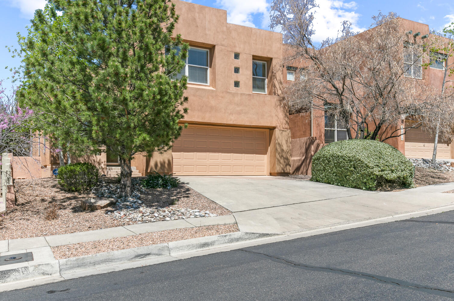 Perfect gem in gated community in High Desert. So many bells and whistles!  New HVAC system with refrigerated air installed in 2023, and Smart Ecobee Wi-Fi enabled thermostat. ! Bright open kitchen with tons of natural light overlooking the sunk in living room with cozy gas fireplace and view of the lush green backyard.  Large primary suite and bathroom with double vanity, garden tub and walk in shower. Loft is a perfect spot for workout room, TV den or office. Front room can be used as another dining area, or formal living room. Backyard is filled with green grass and blooming shrubs including honeysuckles. Garage is perfect for those with lots of ''stuff''. Large cabinetry and hanging shelves for all your goodies. Community pool is perfect to cool off in. Enjoy this secure neighborhood.