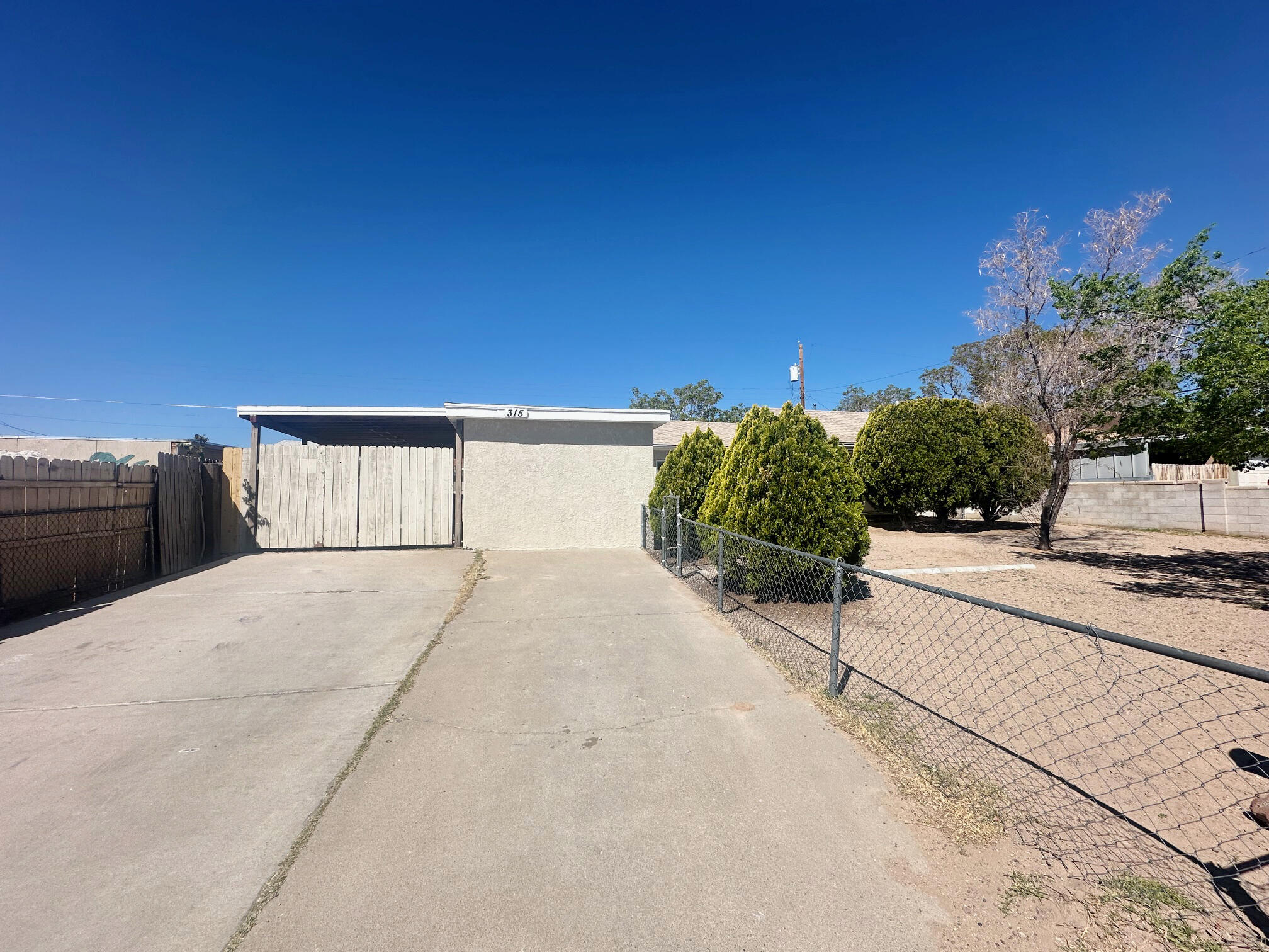 This 2 bedroom, 1 bathroom home is located close to infrastructure such as dining and shopping and convenient access to I-40 and downtown Albuquerque. Newer flooring and paint. Refrigerated air conditioning to stay cool as the temps get higher. Plenty of parking in the driveway and under the carport.
