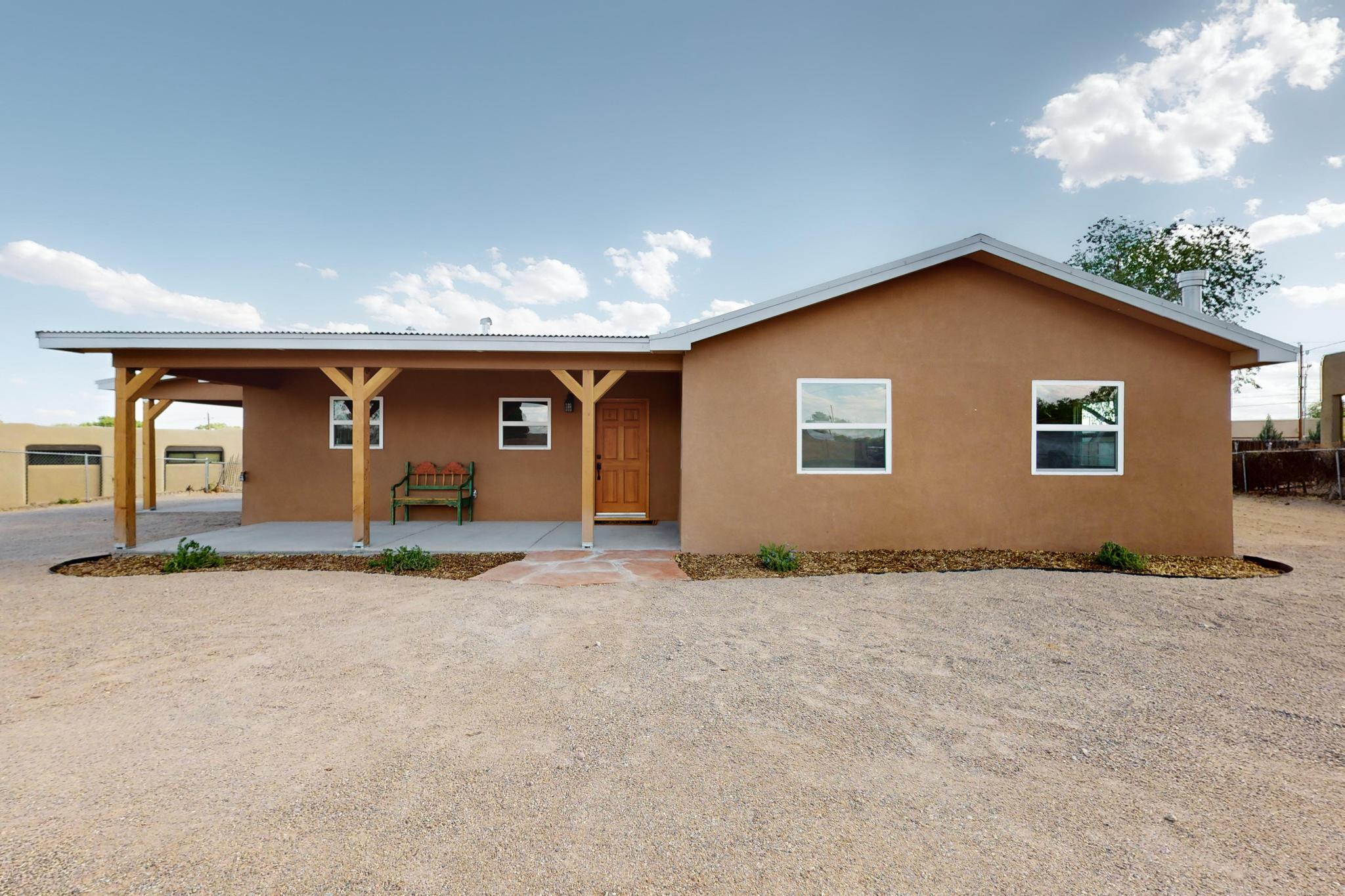 Owner Financing Available with flexible terms! This charming newly remodeled custom home boasts an open floor plan with 3 bedrooms and 2 full bathrooms and an extra room that could be an office, nursery, wine room, or library.  Tile floors throughout, walk in closets, granite counter tops, and ceiling fans all on a large lot to accommodate a garage/shop, barn, stables or whatever you imagine.  This home is close to shopping, restaurants, biking/walking paths and horse trails.  Come make this your forever home.