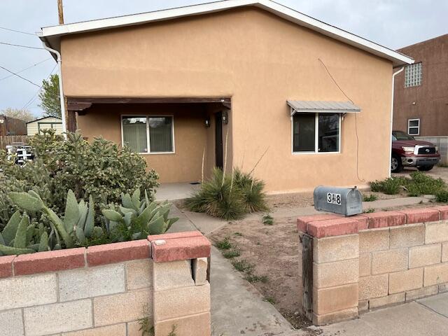 Hard to find smaller adobe in Old Town, one block off Plaza and one block to Albuquerque Museum and Tiguex Park. Wood-burning fireplace in living room. Lot might allow for small casita??? Lots of charm so might work as an AirBnB??? Owner in Assisted Living, family selling ''as is'' with no disclosures, so full home inspection is recommended. Newer pitch roof, stucco and thermal replacement windows added around 2016? Some signs of settlement around vintage metal kitchen sink and cabinet unit. May need electrical and water heater upgrade. Great walkability and bikeability scores, close to groceries, shopping and dining, and E-Z access to freeway at Rio Grande and I-40 and Downtown via Lomas and Central. Heirs selling ''as is.''