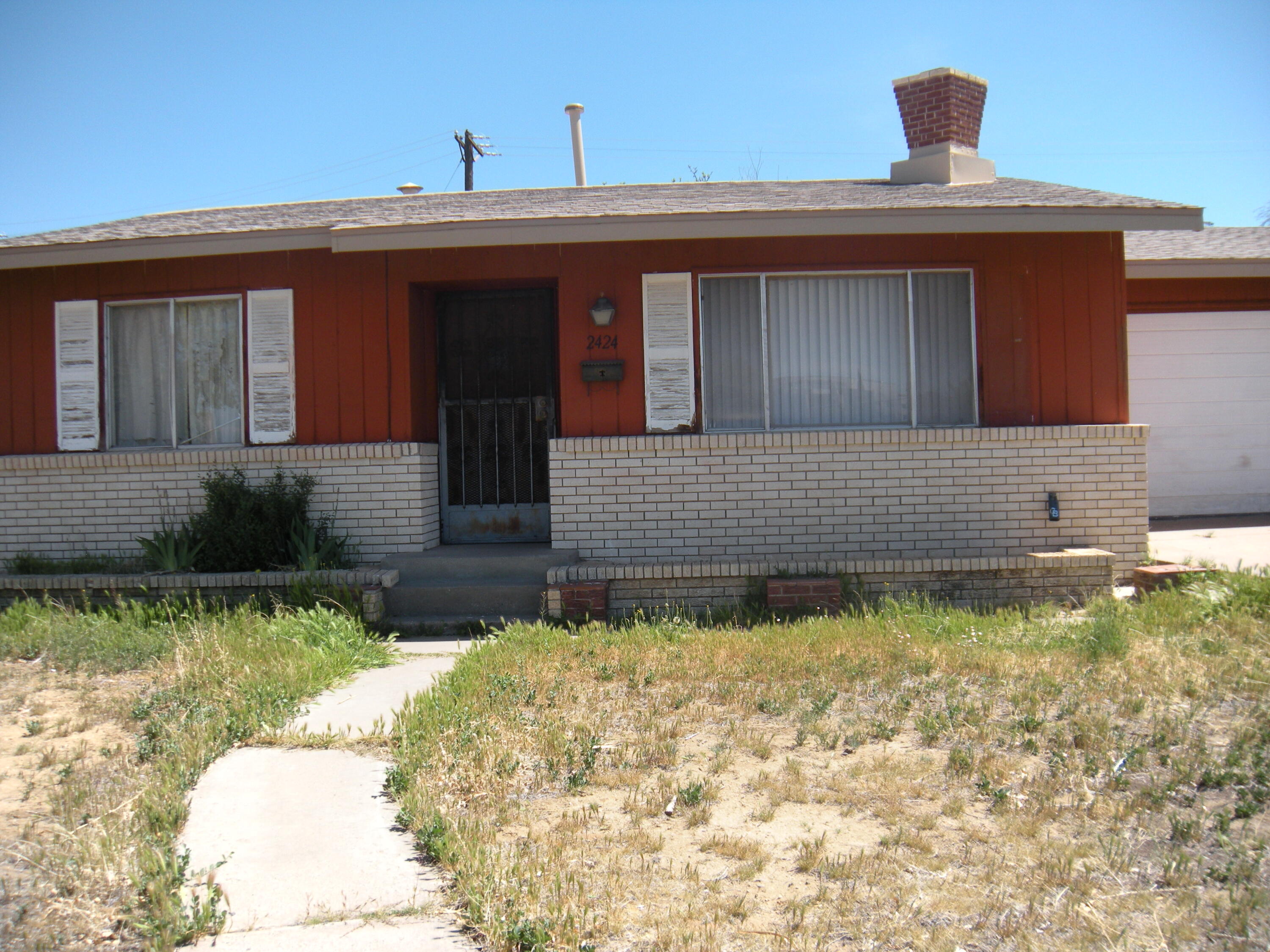 A great Fixer-Upper.  Building is in ok shape but no City water, gas, & electricity for at least 10 years. Very nice huge covered Patio back side of house.