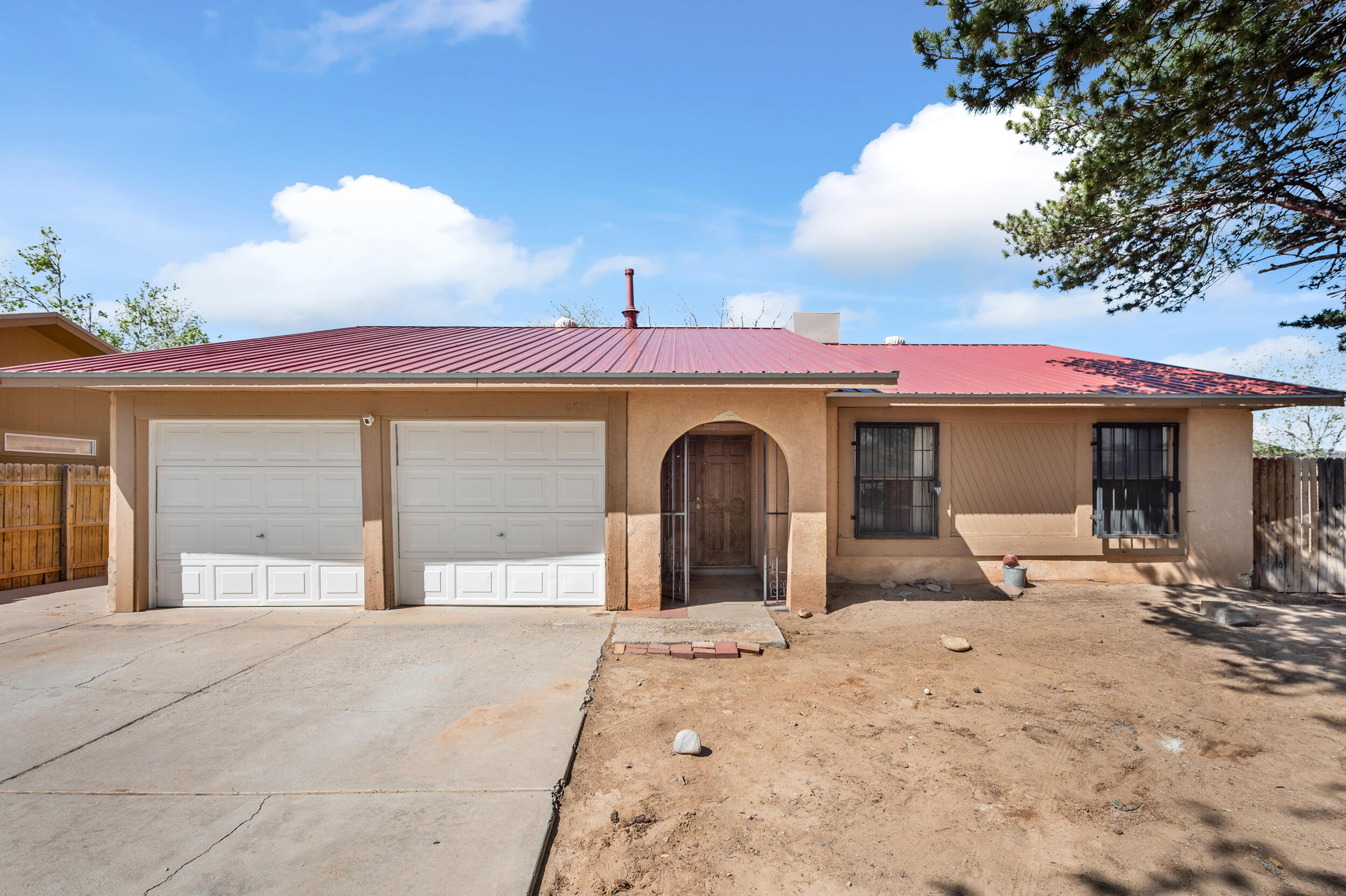 Join us in exploring this beautiful home in Northwest Albuquerque; Ruby. Greeting you with spacious living room, great master bedroom, and recently installed red metal roof along with recently renovated Mastercool and water heater. Ruby serves you with an inviting floor plan, comfortable upgrades, and short proximity to schools, restaurants, and Ladera golf course. Comfortable, warm and solid are just a few words that describe Ruby.