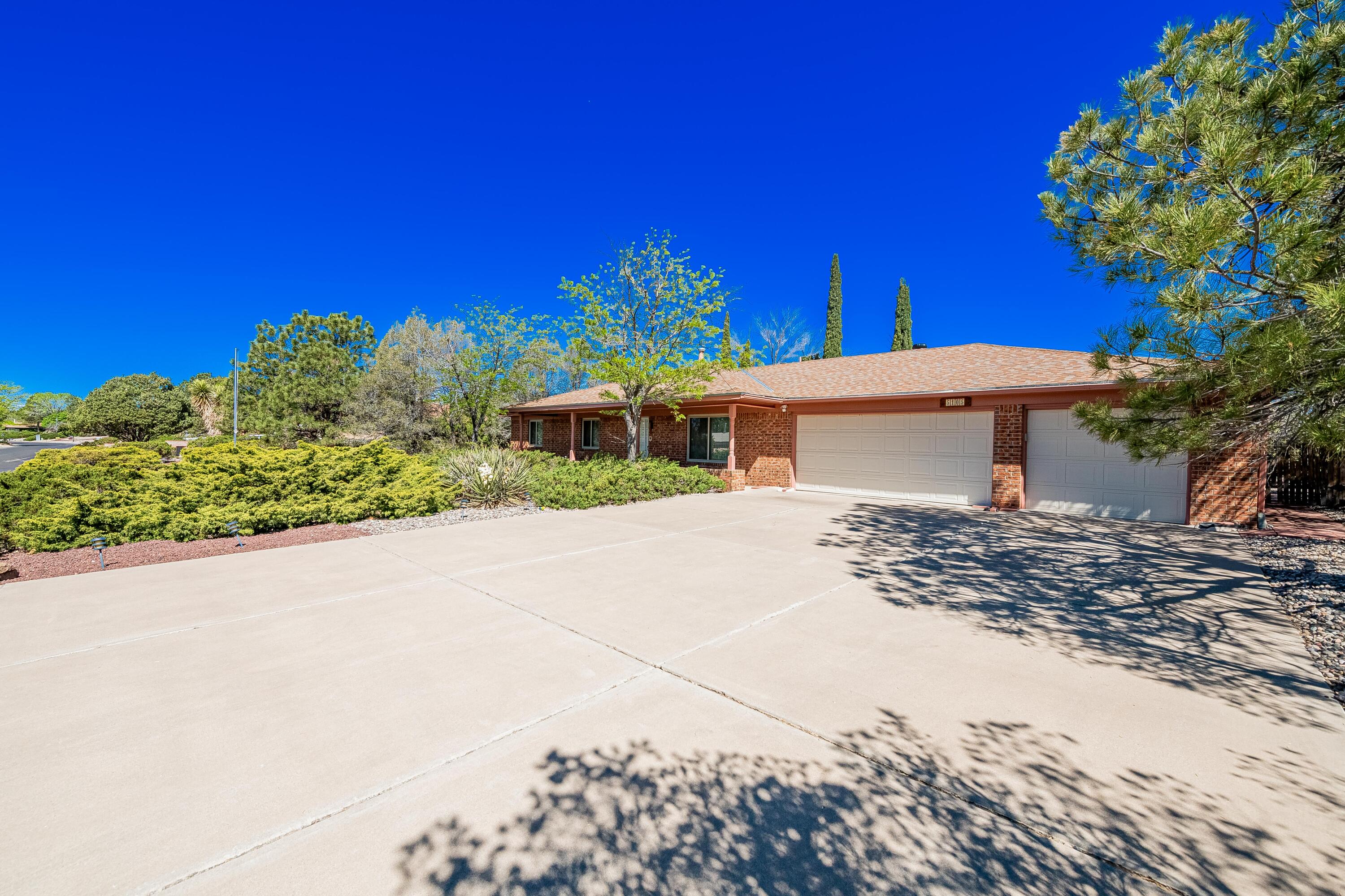 Welcome to your slice of paradise in the heart of Albuquerque's serene Paradise Hills neighborhood! Nestled on a spacious lot, this charming ranch-style home boasts three bedrooms, offering ample space, a cozy ambiance and an open floor plan seamlessly connecting the family room, dining, and kitchen areas perfectly for both intimate gatherings and entertaining guests.Prepare to be enchanted as you step outside onto your landscaped front and backyards, where lush greenery provides you with a tranquil retreat. Imagine unwinding on your patio, savoring the picturesque views of the adjacent golf course and NM sunsets. This home is ready for your personal touches and priced accordingly. Come by and fall in love with this one!