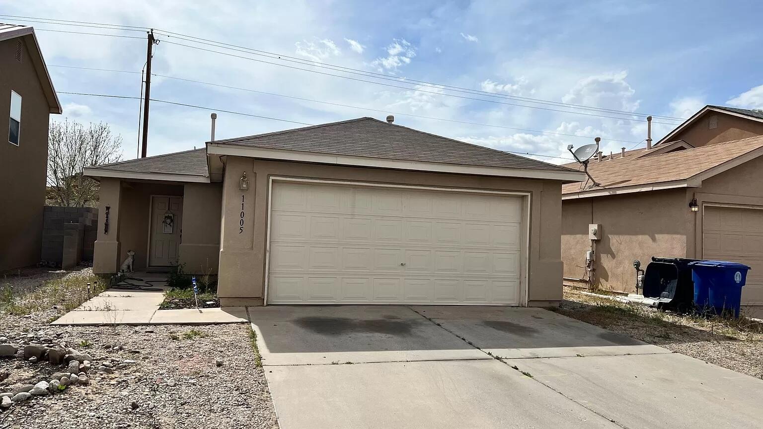 Welcome to this charming 3 bedroom, 2 bath with open floor plan. 2 car garage. Easy maintained landscaped backyard is perfect for your backyard bbq's. The home is nestled in the vibrant heart of Albuquerque's West Side. Home has been updated with new appliances, wood & tile throughout, 6 ft block wall. Home is currently used as a successful rental.