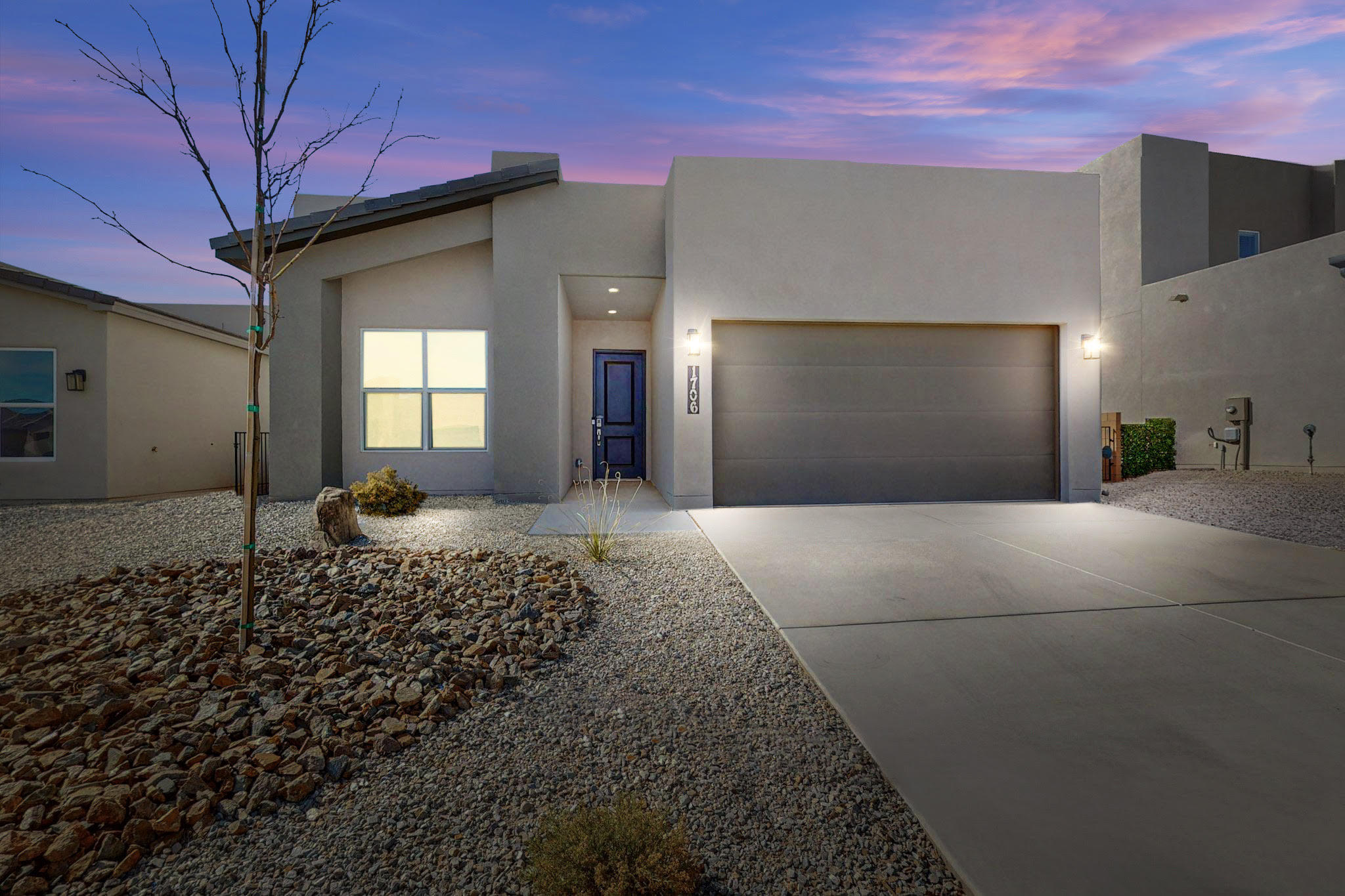 Welcome to this beautiful MODERN ONE-OWNER ranch home in Tesoro at Fiesta! Built in 2022, in pristine form, with over 1700 SF, 3 beds, and 1.75 baths, this gem boasts irresistible charm! A fully xeriscaped front yard offers stunning curb appeal, while inside, discover an inviting open floor plan with top-notch finishes. The kitchen is perfect for a chef with granite countertops, an island, and a convenient beverage bar. Enjoy meals in the formal dining area or relax in the spacious great room with a cozy fireplace. The owner's suite offers luxury and privacy with a walk-in closet. Step outside to a covered patio and a low-maintenance gravel backyard, perfect for entertaining. Near amenities, park, and easy access to I25. Don't miss this one!