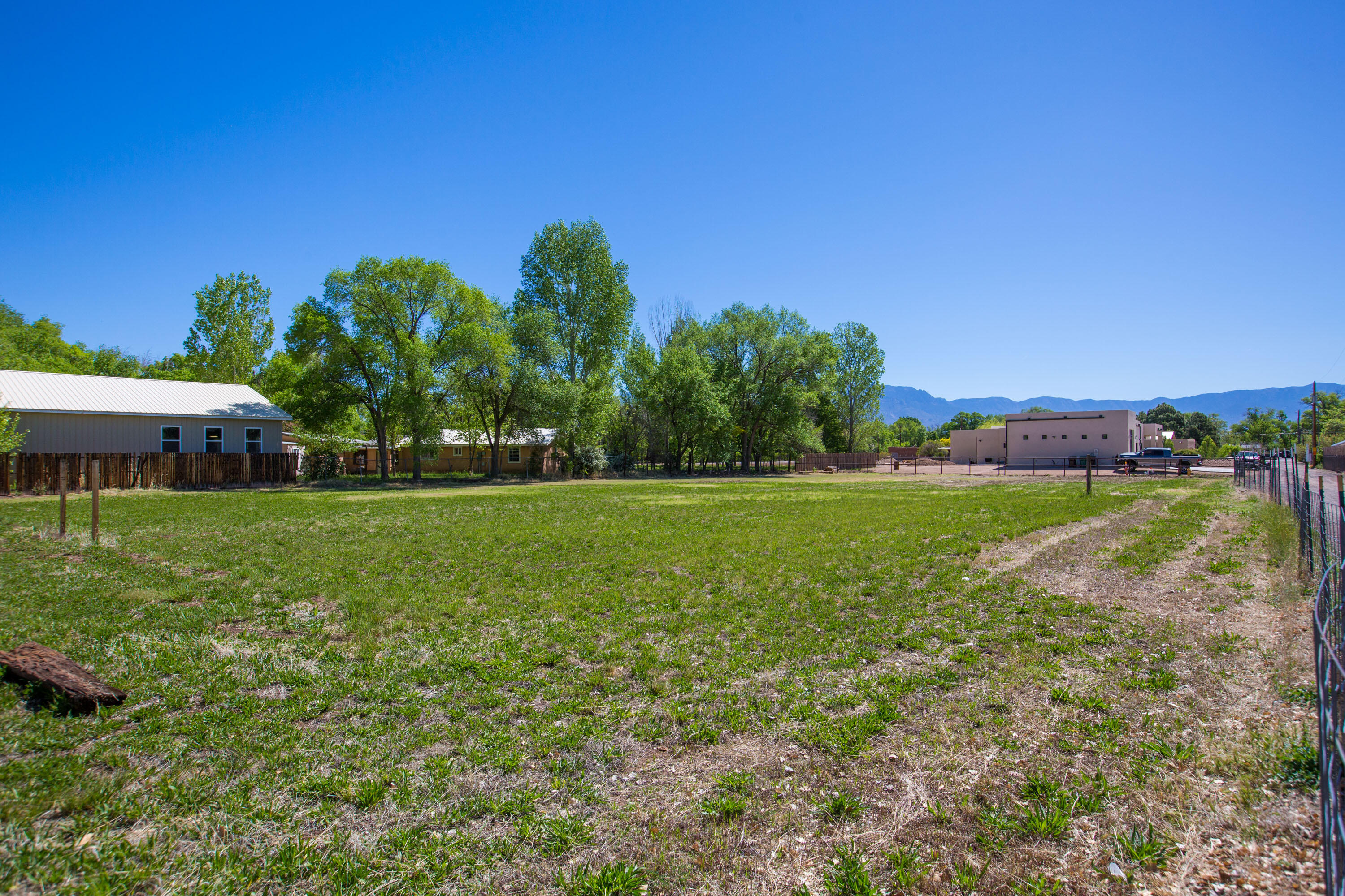 Beautiful, peaceful North Valley residential lot ready for your dream home. Hidden down a quiet lane off of Guadalupe Trail, this property offers the perfect location for North Valley life and an easy commute to all that Albuquerque and Los Ranchos offer.  All utilities in place.