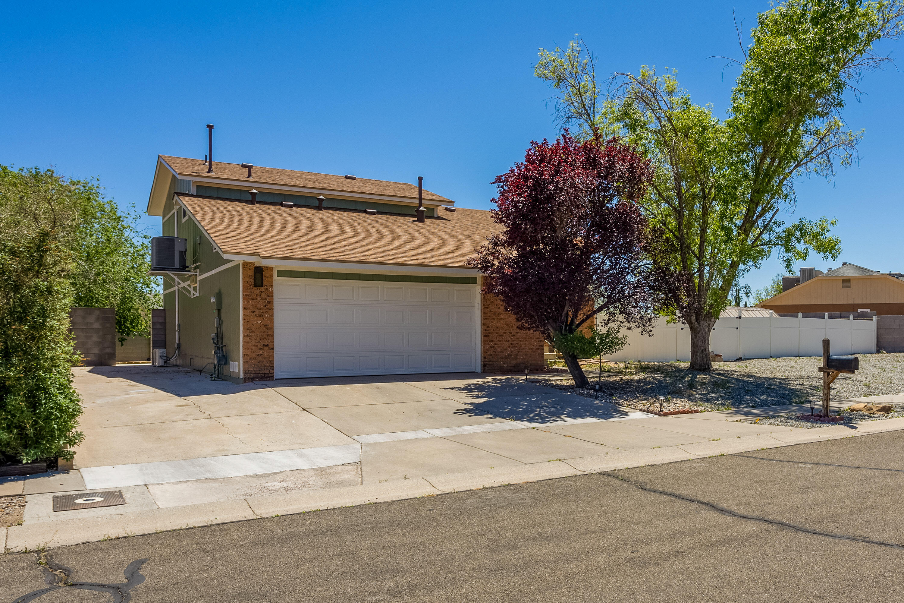 Welcome to this stunning Tri-Level home with vaulted ceilings in the Trinity Ranch neighborhood! Situated on a large lot with side yard access, this home offers both space and convenience. This home has been lovingly updated, with a newer tile roof (2023), along with a furnace and refrigerated air unit (2018) for year-round comfort. Additionally, the home features an isolated mini-split, ensuring efficient temperature control. Inside discover a beautifully renovated interior, featuring LVT flooring throughout. The upstairs primary bathroom was recently renovated (2024), boasting modern finishes. The expansive backyard is an oasis, complete with turf, a deck and perfect for outdoor entertaining. Don't miss your opportunity to own this gorgeous home in a desirable neighborhood.