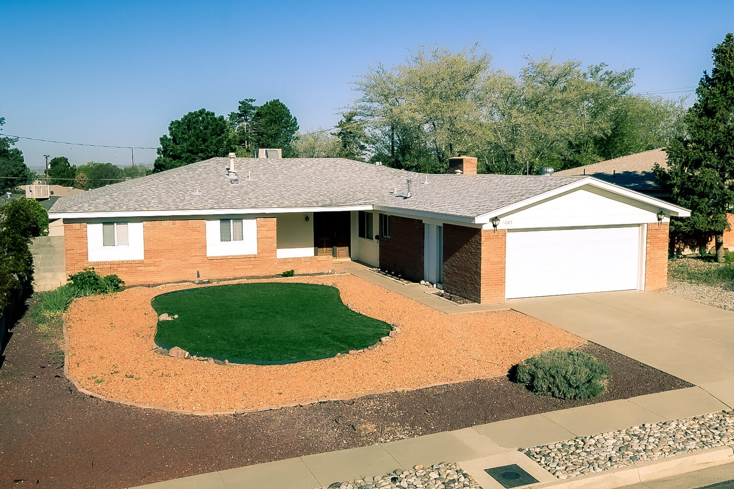 This all Brick veneer home in a mature neighborhood has a nice covered porch in the front yard and a lovely covered patio in the private back yard with large trees and shrubs. The home has two large living areas plus a separate dining area. Large sized bedrooms and updated bathrooms.