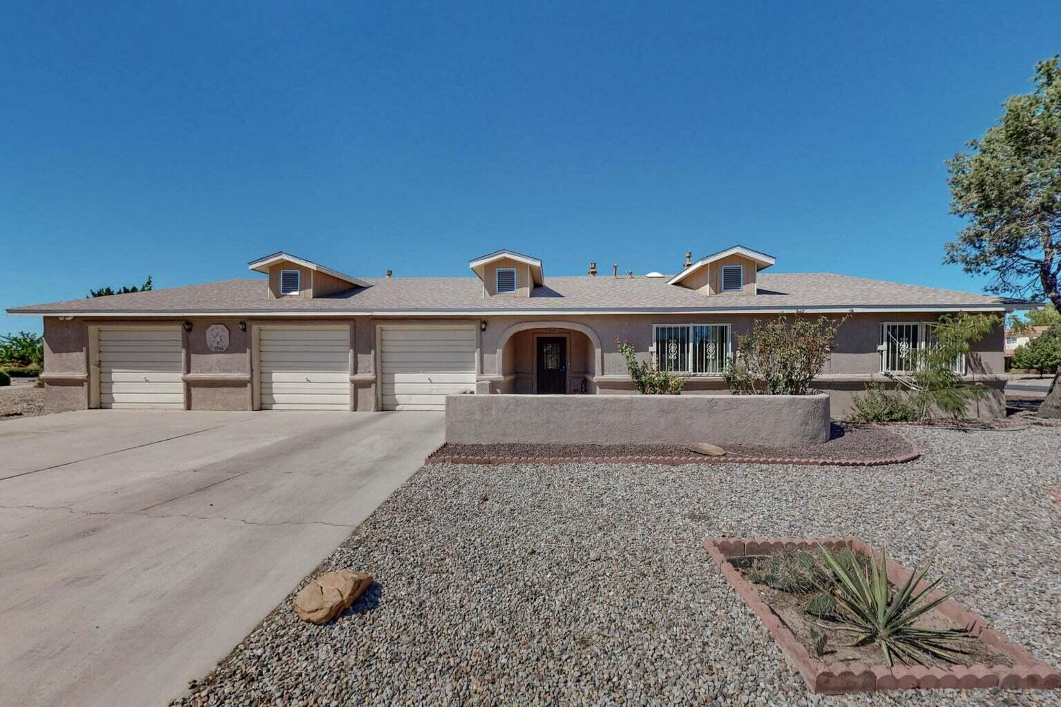 Don't miss this great home in a golf course community. Convenient to Highway 47, and just 15 minutes from Los Lunas. Spacious floorplan boasts 4 bedrooms and 2 baths. Open concept living area and kitchen is great for entertaining. Beautifully updated. Large primary bedroom is separate from the other bedrooms with walk-in closet and private access to the backyard. Primary bath with double vanity. Huge backyard and covered patio! 3 car garage, 1 bay is set up and ready for the auto mechanic in your family. Welcome home!