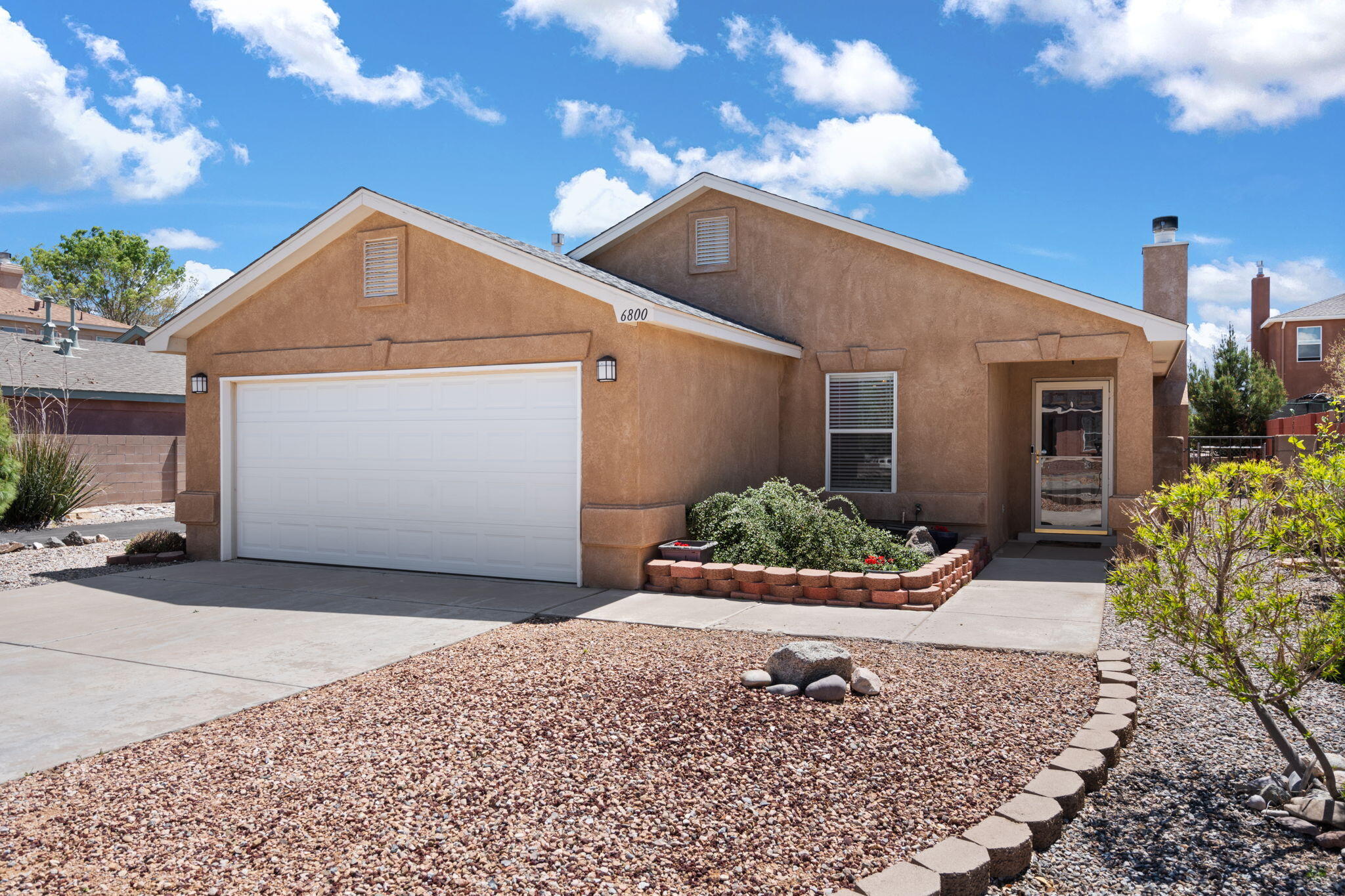 Welcome home to Ventana Ranch! This charming single story, 3 bedroom/2 bathroom home offers a spacious floorplan; easy care ceramic tile/engineered wood/laminate flooring; crown molding; interior archways & openings; & so much more. Tranquil primary suite is privately situated at the back of home & features its own private bathroom. Low maintenance front & backyards, large covered patio ready for relaxing or entertaining, dog run w/doggy door; trees; & a variety of plantings & shrubs. Ring doorbell conveys. Enjoy close by community pool, trails, parks, restaurants, & amenities.