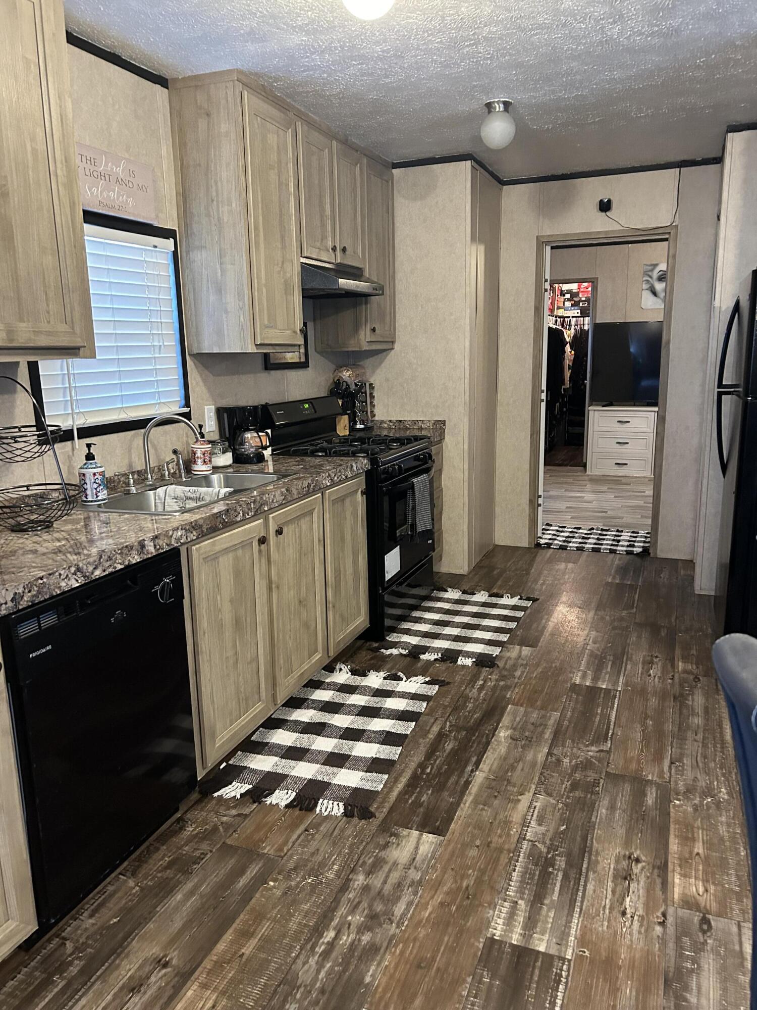 Cleanest and best well kept Manufactured home you have ever been in!!!Seller bought this unit brand new and has kept it immaculate. Come see for yourself. Decent side/back yard area for dogs or relaxing after a long day! Inside is spic and span with no carpet. two blocks from the playground and food trucks! Land lease is $617.00/month.
