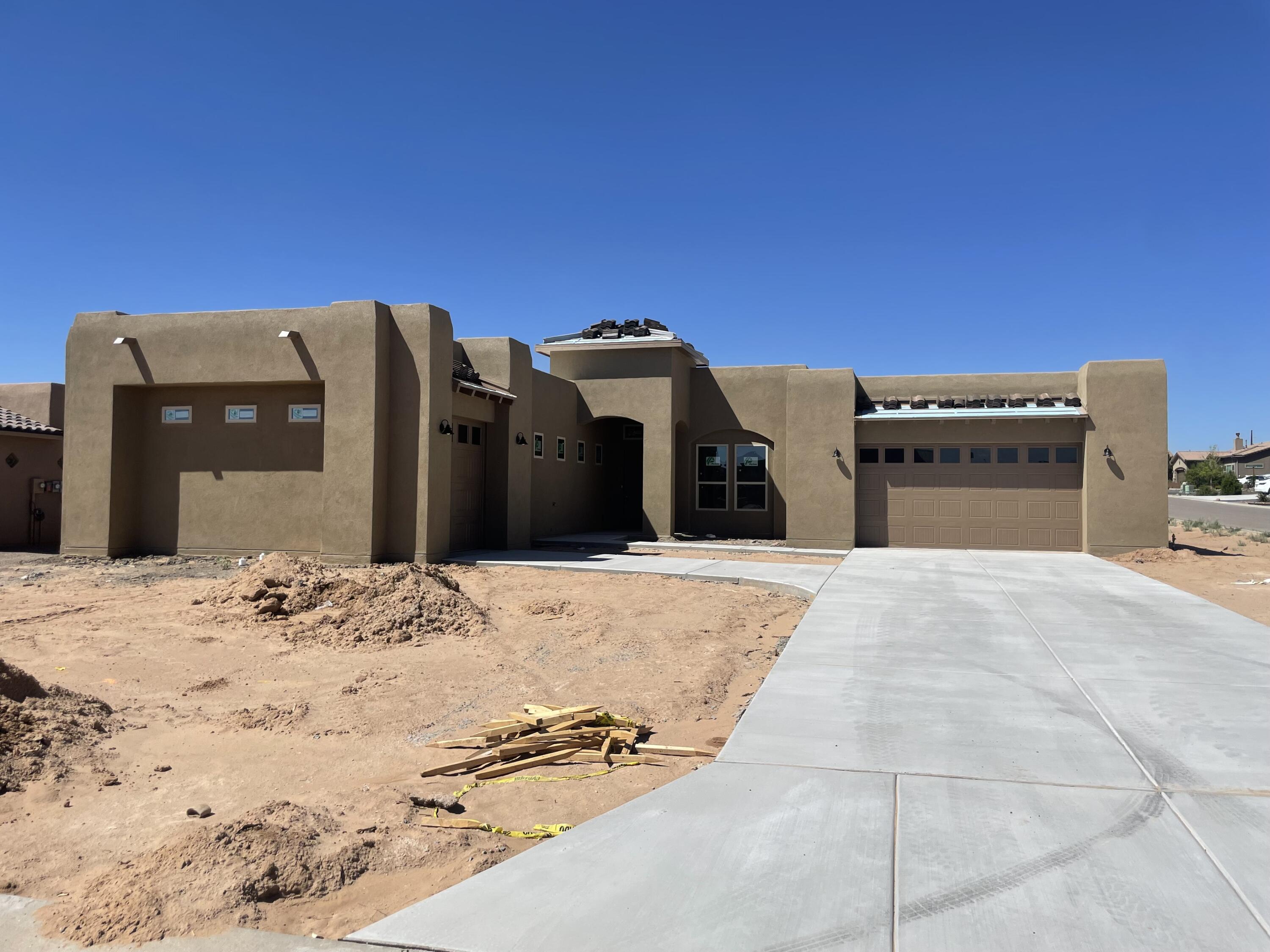 This beautiful new construction home sits on a half acre corner lot, with paved roads, and all city utilities.  It features high ceilings, open space, and plenty of separation between bedrooms. A definite must see!  The home will come with an kitchen appliance package: dishwasher, refrigerator, microwave, and gas range stove.  The builder is also contributing up to 2% of the buyer's loan amount towards closing costs, if the buyer uses the builder's preferred lender. Home is currently under construction.  Actual colors, finishes, and plan features are subject to change.