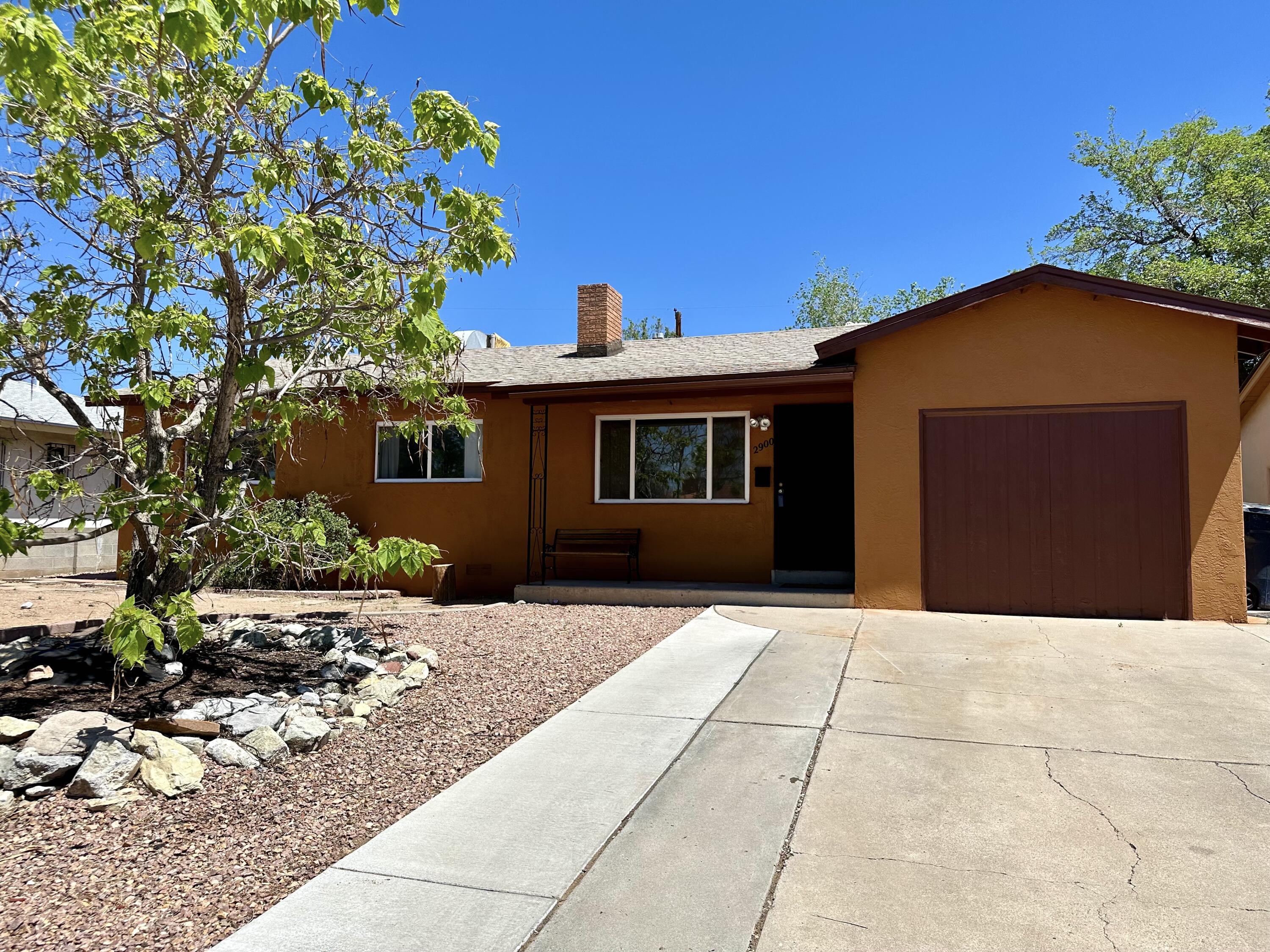 Charming 4 bed, 2 bath house in heart of Albuquerque. Real hardwood floors & fireplace add cozy touch. Great backyard for entertaining, with large storage shed. Near shopping, dining & freeway access. Ideal for those who need a little space.