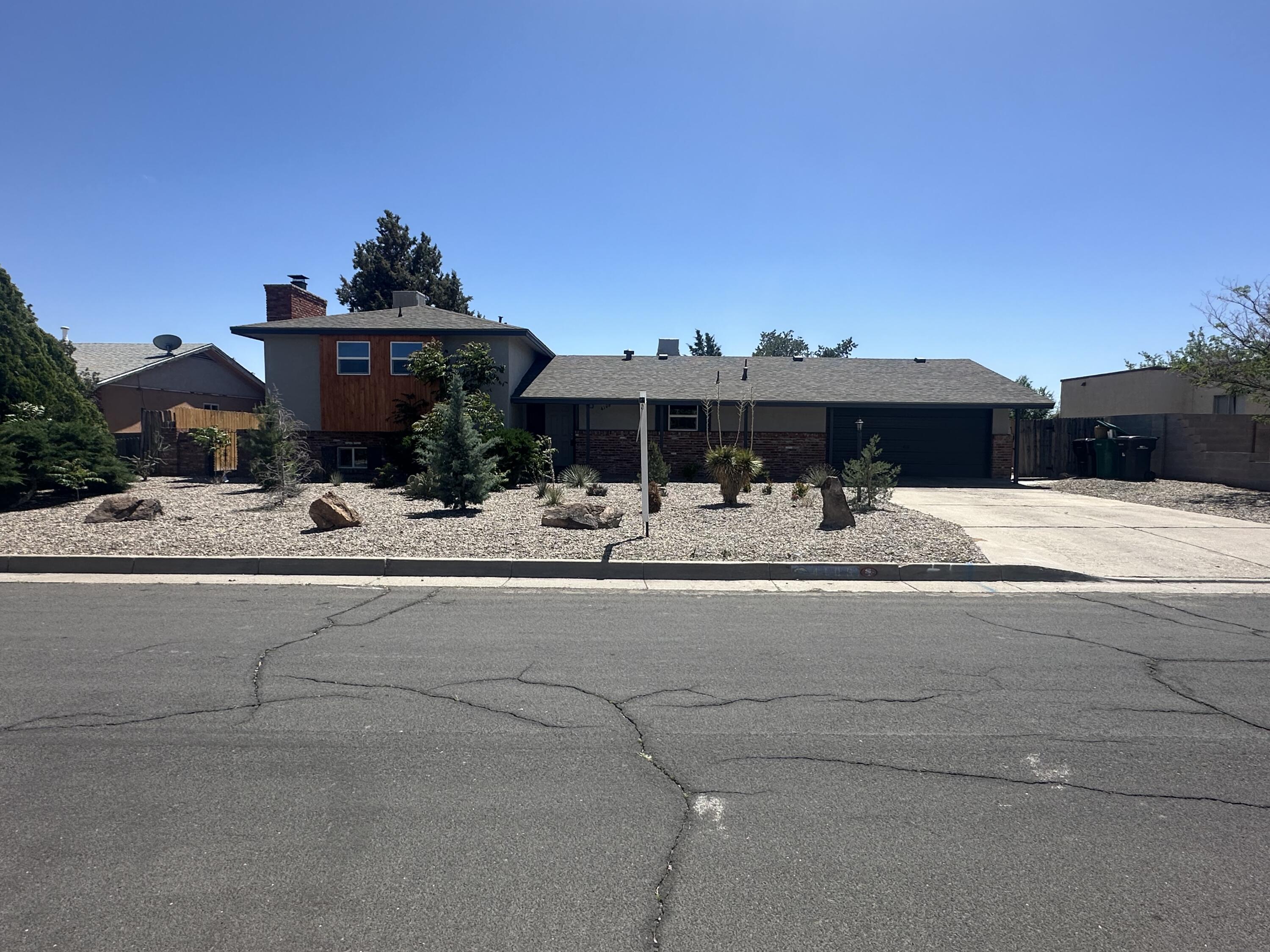 **SOLD FURNISHED**Wonderful split level floorplan in Rio Rancho.  This home has been updated and is move in ready! This lovely home offers 2 Living areas with an owners suite and a second mini master on the bottom floor. Updates in 2019 include:  Roof, windows, swamp coolers, paint, flooring, carpet, stainless steel appliances convey, kitchen has been updated and includes granite with tile backsplash and custom cabinets. Bathrooms have been updated and include custom vanities and beautiful tile backsplash in the showers. Conveniently located in Rio Rancho this lovely home includes a great size back yard!