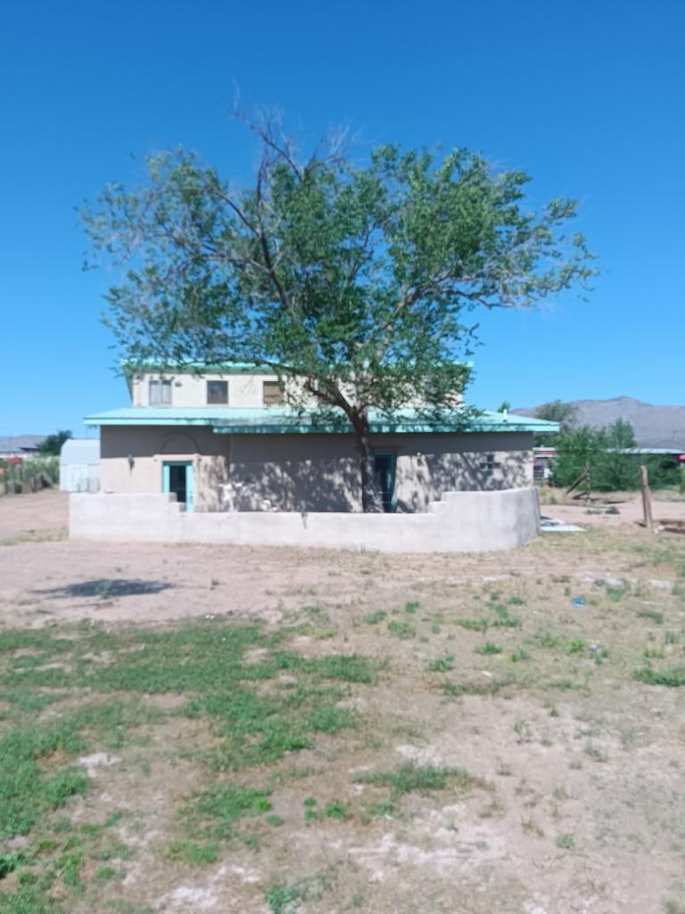 Charming older adobe. Many upgrades performed.  Experience a quiet lifestyle, yet close to town.