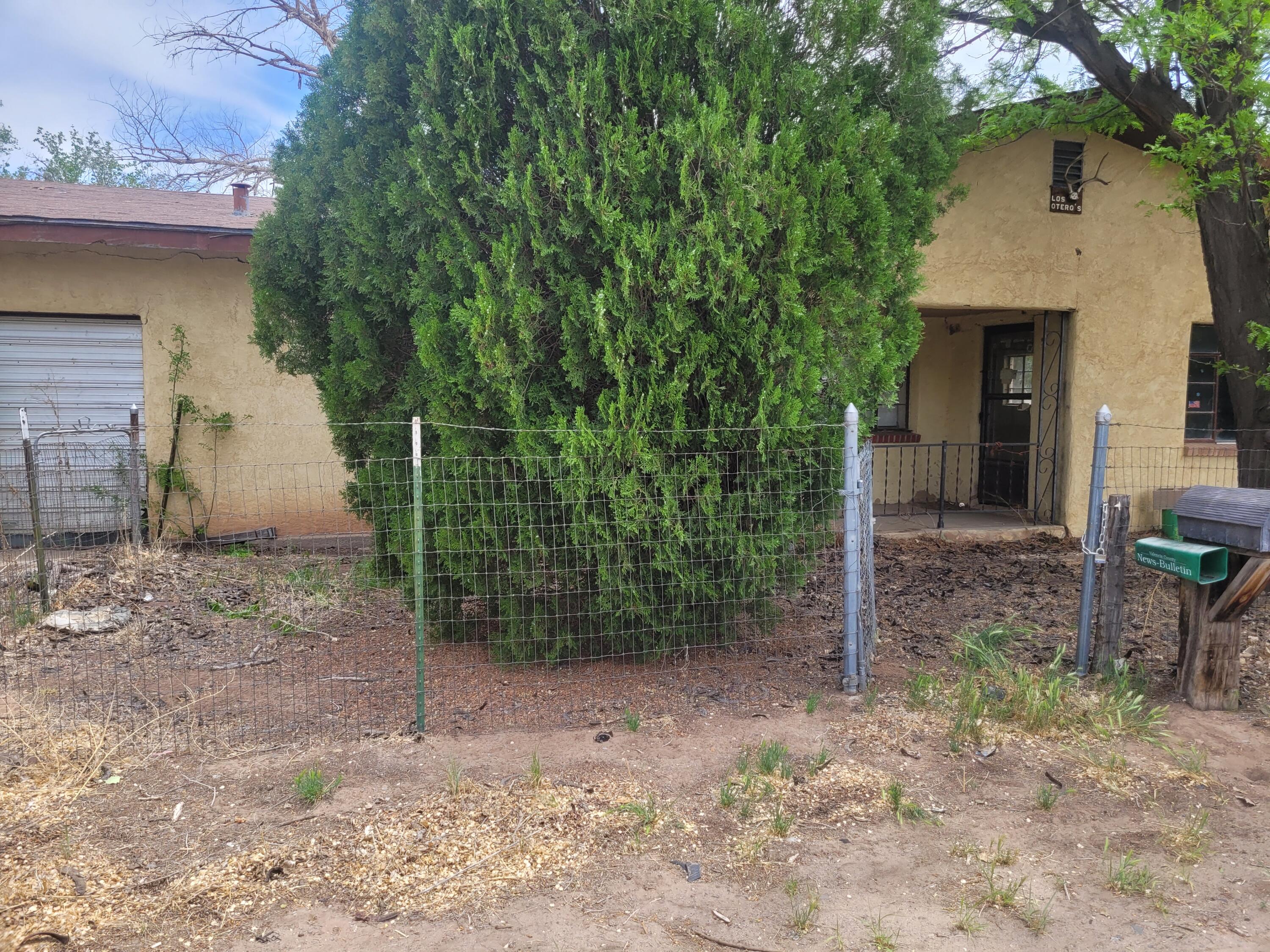 Wonderful property with tons of potential.  Lot has Utilites and a current single-family resident.  Home is in need of repair.   Lot has irrigation rights.  There are other structures on the property.  This is a must see.  Property is sold as is.