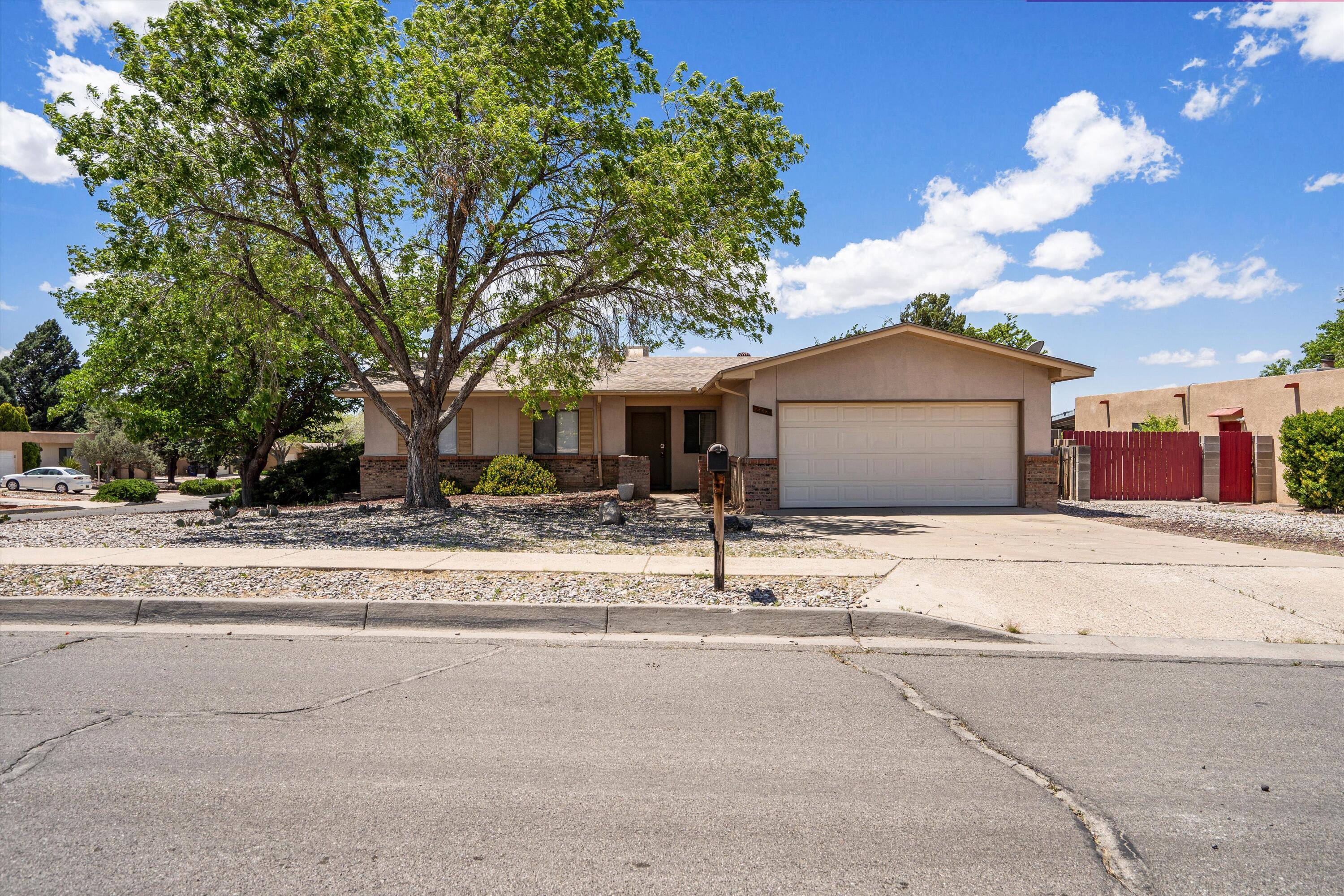 Located on large corner lot in the far NE heights this 3 Bedroom , 1.75 Bath, 1 story home features  2 living area, with laminate wood floors throughout most of the home, and large backyard.  Great schools, shopping and restaurants nearby.  Bring your creative ideas.