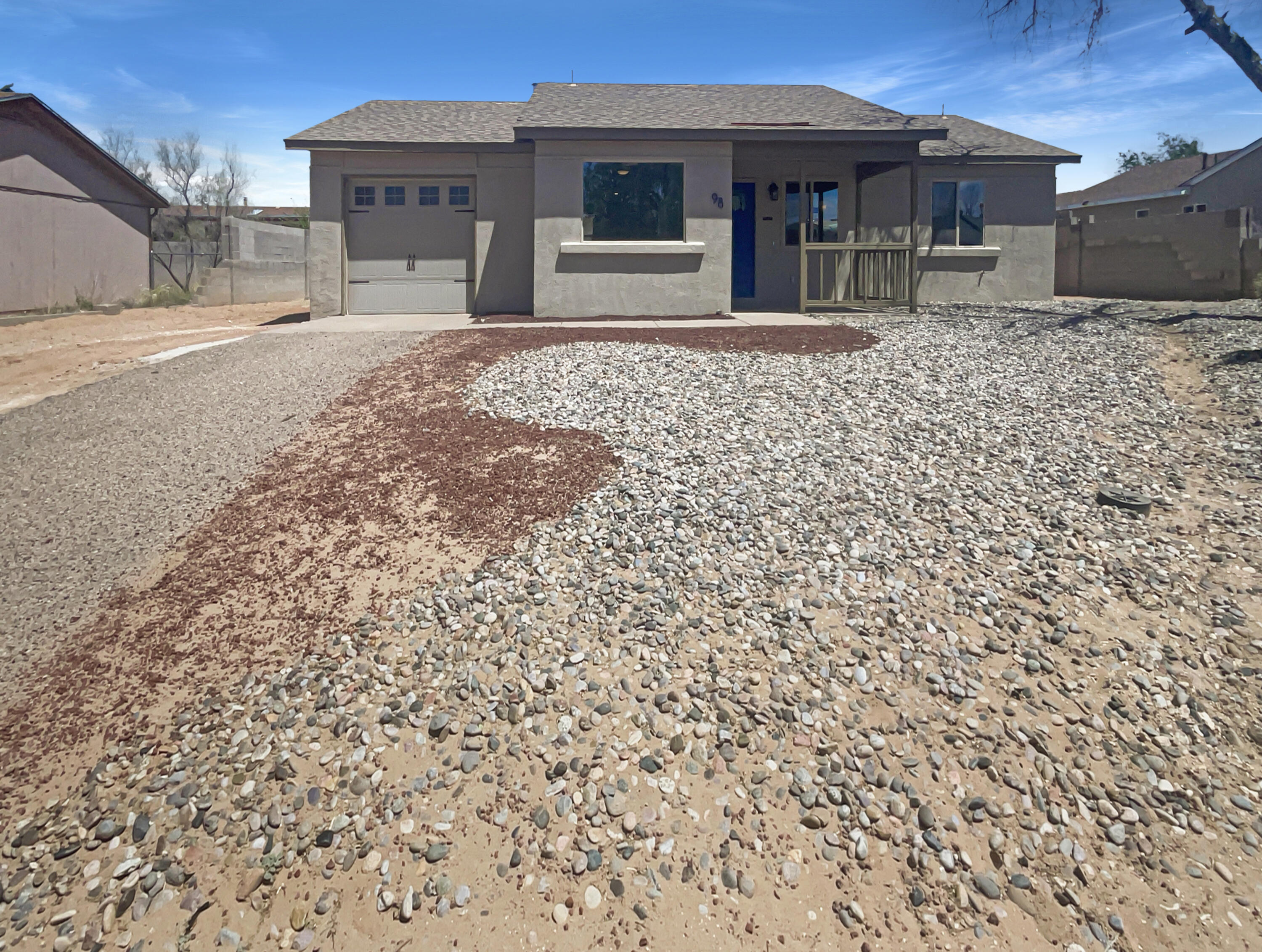 This Rio Rancho one-story home offers quartz countertops, and a one-car garage.