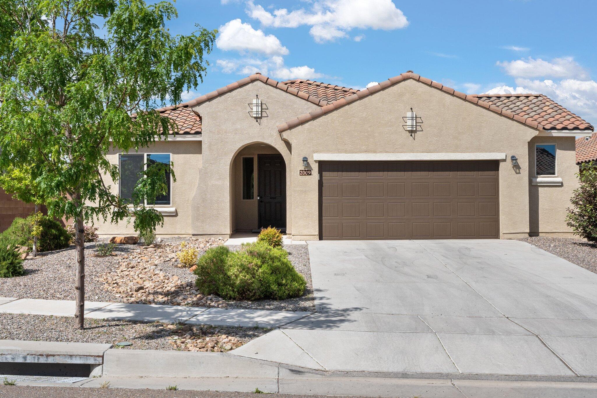 Welcome to the picturesque Mirehaven subdivision! This single-story home features four bedrooms, two bathrooms, and a 2.5 tandem garage with an 8-foot door, making it ideal for families. The Gateway floor plan boasts an open concept, creating a wonderfully spacious atmosphere. Indulge in the gourmet kitchen, complete with a sizable granite island, built-in appliances, and ample cabinet space. Cozy up by the fireplace in the great room! The primary bedroom showcases an ensuite bathroom with a large shower. Step outside and unwind in the backyard with its covered patio. Conveniently located near I-40, shops, and dining. Schedule your showing today!