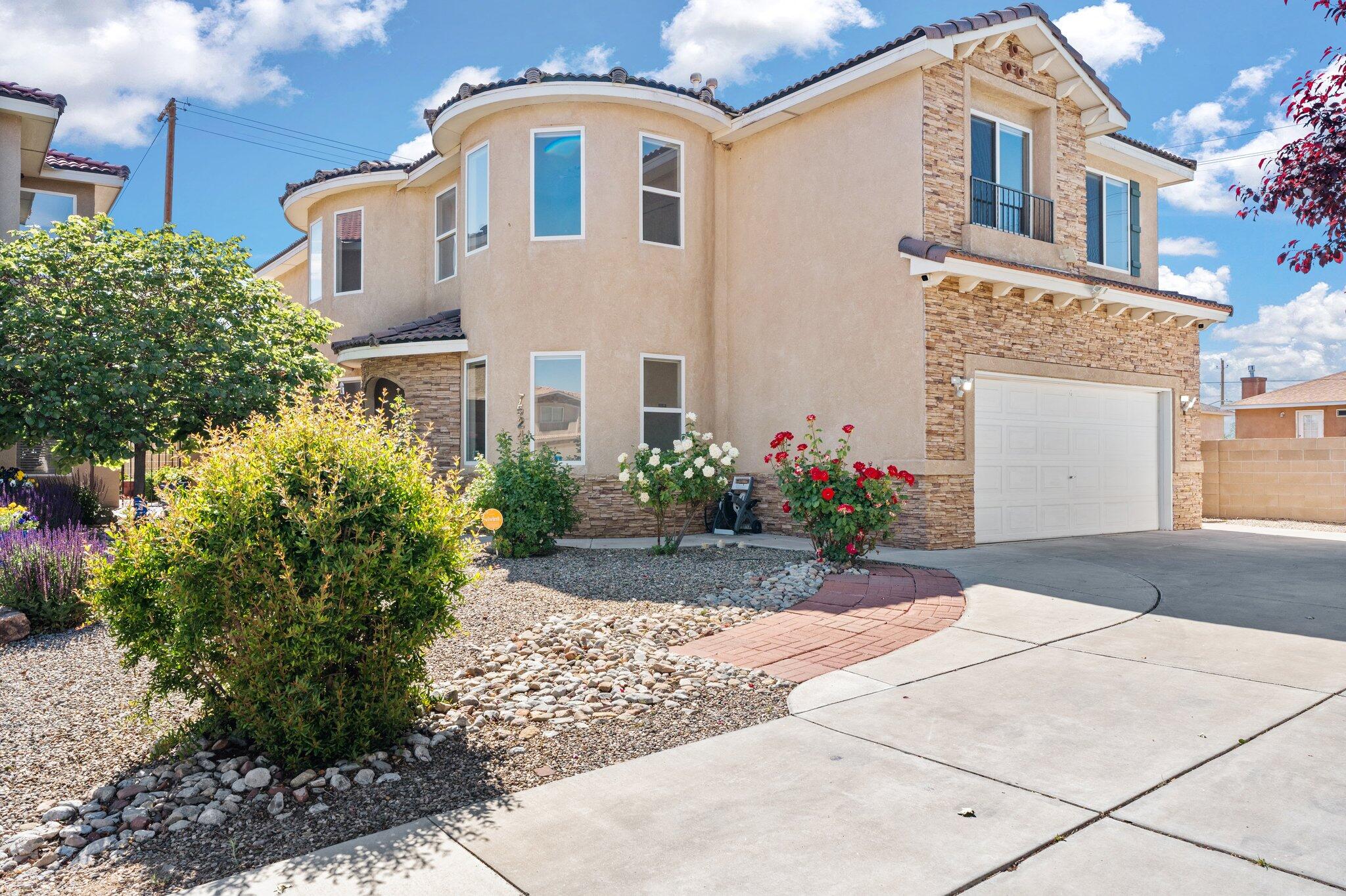 Come see this beautiful turnkey home in the La Cueva school district! It features 4 bedrooms plus an office, 3 bathrooms, 2 car garage, and a long driveway that is able to fit an additional 5 cars. The kitchen is open to one of the two living areas and features granite countertops, stainless steel appliances, and ample storage space, making it perfect for both cooking and entertaining! Retreat to the luxurious primary bedroom with amazing views of the Sandias from your balcony. Refrigerated air and absolutely no carpet!! Outside, enjoy the backyard oasis, complete with an incredible saltwater pool and hot tub!! With its convenient location close to parks, schools, and shops, this home offers the perfect blend of comfort and convenience. Schedule you private showing today!