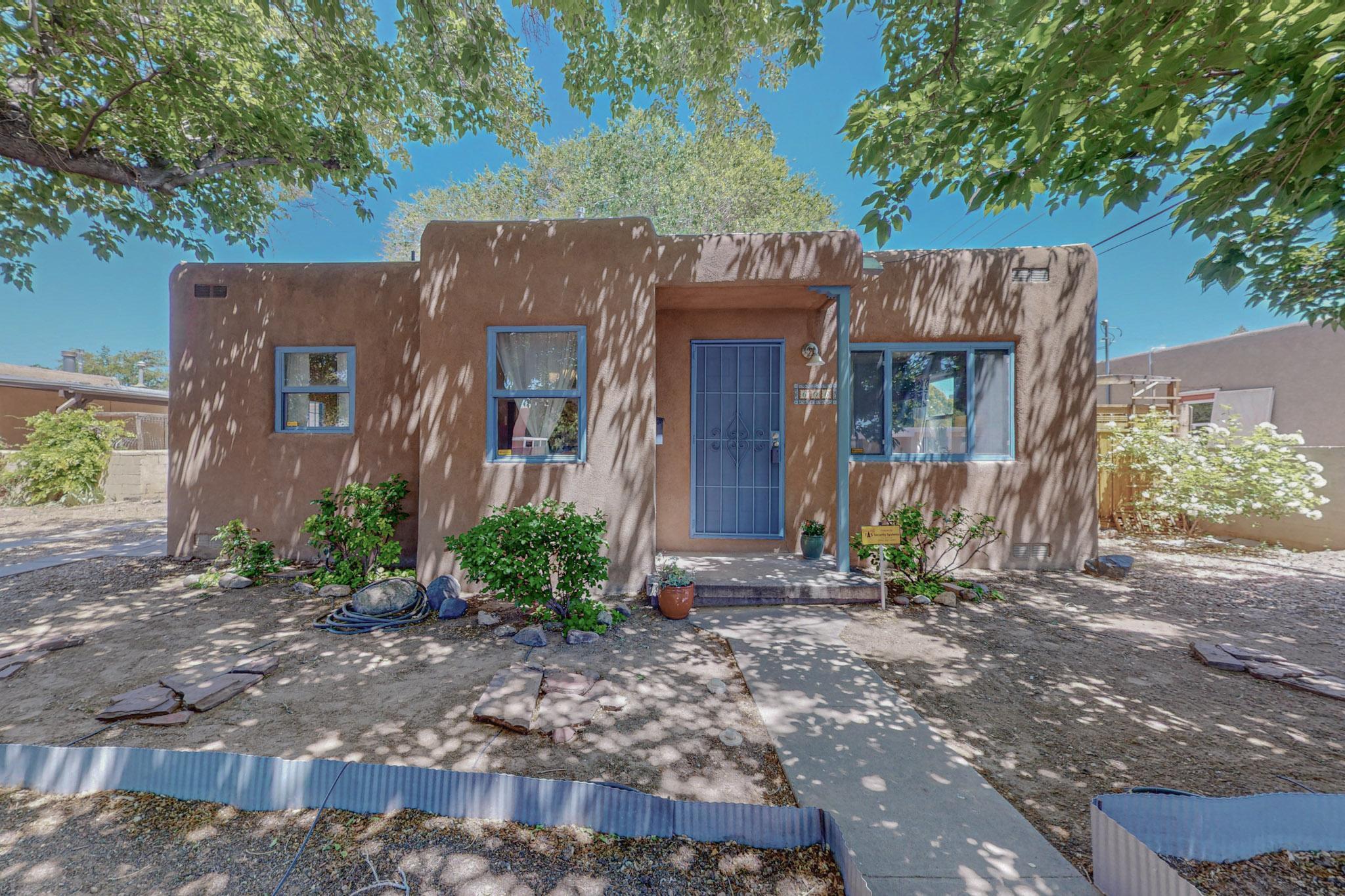 Adorable 2 Bedroom/ 1 Bathroom/ 1 Car Garage, 870 SF home in Parkland Hills, adjacent to Nob Hill, easy access to Downtown/Uptown/Airport/Kirtland AFB/Sandia Labs/UNM. Lightly traveled street. Hardwood floors refinished in 2018. The kitchen has lots of cabinet space, built in microwave, dishwasher and gas stove; the kitchen lighting and appliances were updated in 2017. A master cool evaporative cooling system, garage door and washer/dryer were replaced in 2018. New water line 2019, 200-amp electric 2018. A TPO roof installed 2024! The property was landscaped and beautiful gates installed in 2018, and an irrigation system set up in 2019 that has four zones. Relax in thie beautiful backyard on the shady west side of the home and enjoy the lovely flower garden and Fruit Trees!