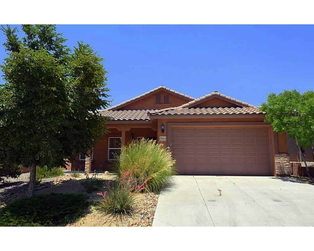 Are you searching for an immaculately kept home with some of the most amazing views in Rio Rancho? If so, you must schedule a showing! Take a break and relax in the patio as you gaze at the colors of the sunset or have your morning coffee and watch the sunrise over the Sandias. Take walks in the neighborhood and stop at some of the beautiful parks along the way. The kitchen is a chef's dream, with granite countertops, pull-out drawers in all cabinets, and all appliances conveying.. If you enjoy peace and beauty this home is a must see! Priced below builder specs in LOMA COLORADO. Great home with tile roof, exterior stone accents and covered front porch on fully landscaped lot. Wonderful upgraded carpet and ceramic tile with medallion in the foyer. 2 spacious living areas.