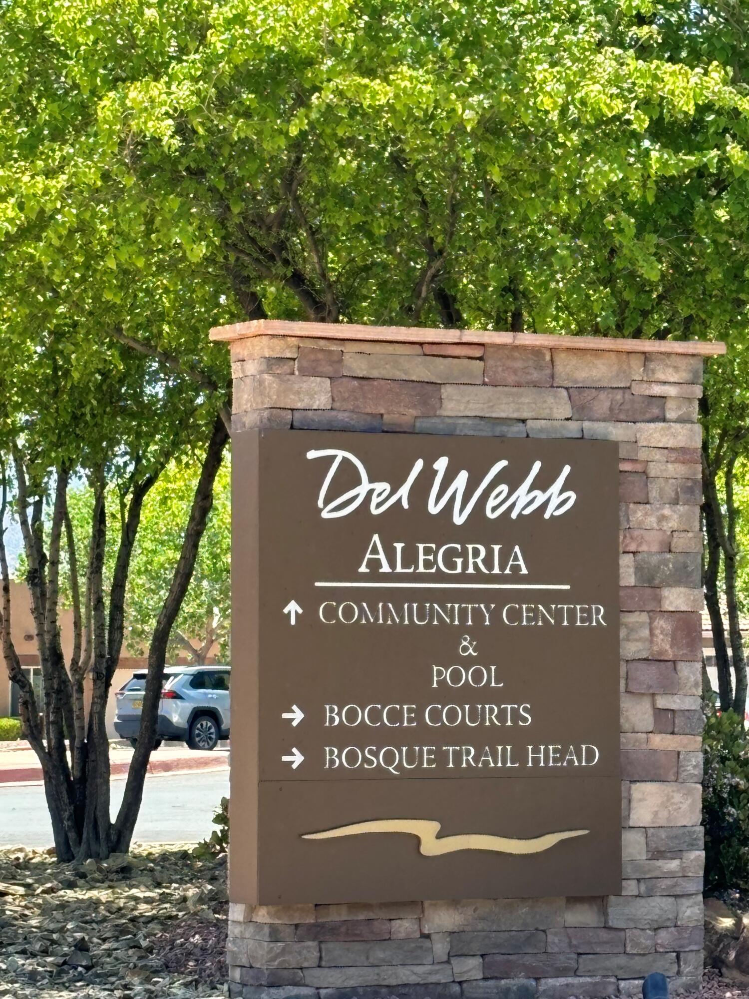 Glorious Del Webb Alegria neighborhood:   Gated planned community for 55+ in the heart of Bernalillo- this home lies near the community pool & clubhouse with a beautiful corner lot!  Wide open floorplan with huge kitchen island- lots of seating, pantry!  Fabulous flooring- large neutral tile and recent hard wood floors & carpet.  Recent hot water heater, recirculating hot water!  Super convenient to restaurants & shops.  Lovely zero-scape, easy maintenance, automatic sprinklers covered patio with gas stub for BBQ!  Faces Northeast.  Call to view this impeccably maintained home today- it wont last!