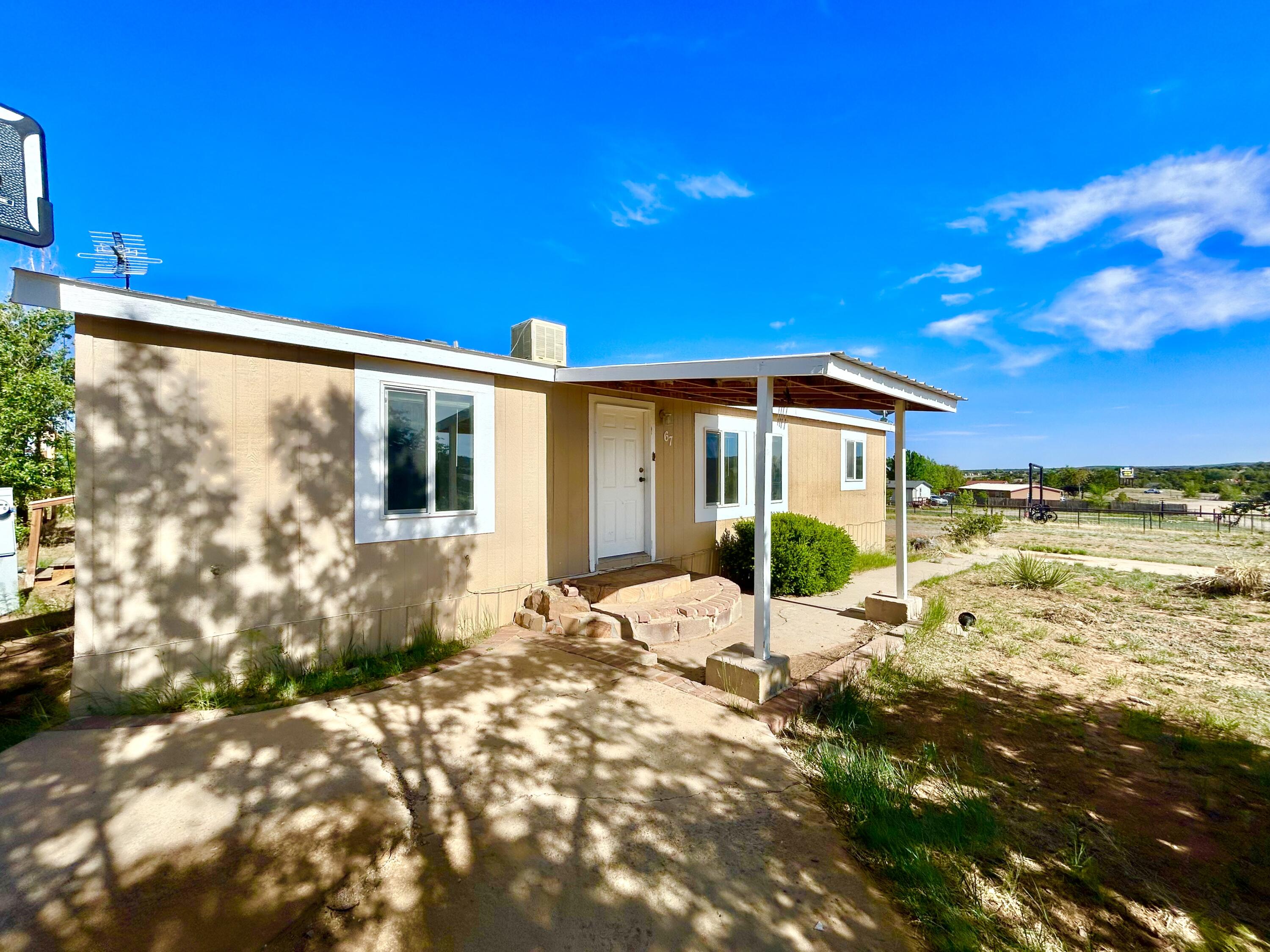 Welcome to Edgewood New Mexico.   3 bedroom 2 bathroom split floor plan.    Refrigerated  air conditioning.   New plant and updated flooring.