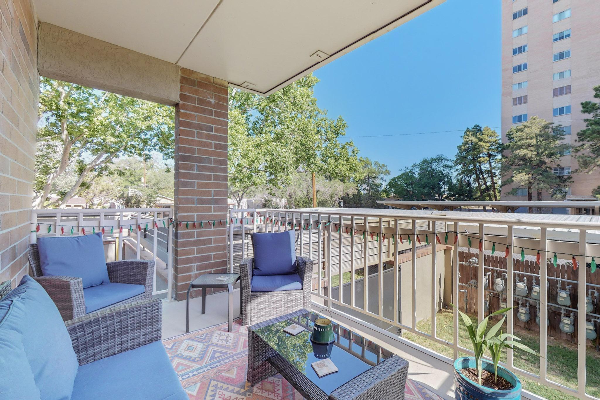 Cozy, Fully Remodeled 2 BR Condo w/ Fireplace & Balcony w/peek a boo mountain view.  Close proximity to downtown growers market, zoo, restaurants, old town and more! This condo was fully renovated in 2023: tankless Water heater, HVAC dual heat/ac recently replaced. Bath/Kitchen fully remodeled. jet tub.The Seller's replaced 2 balcony doors and added 3, double pane storm doors. New Windows, New kitchen backsplash, under cabinet lighting, quartz counter tops, stacked w/d installed 2023. kitchen appliances replaced 2023. Cove ceilings, Steel door added to storage room (in garage). Insulation added. On deck is a community BBQ grill, Dog park on North side of building, fruit trees: cherry, peach, apple, pomegranate. All appliances convey, wine fridge. Has storage unit & 2 covered garage spaces