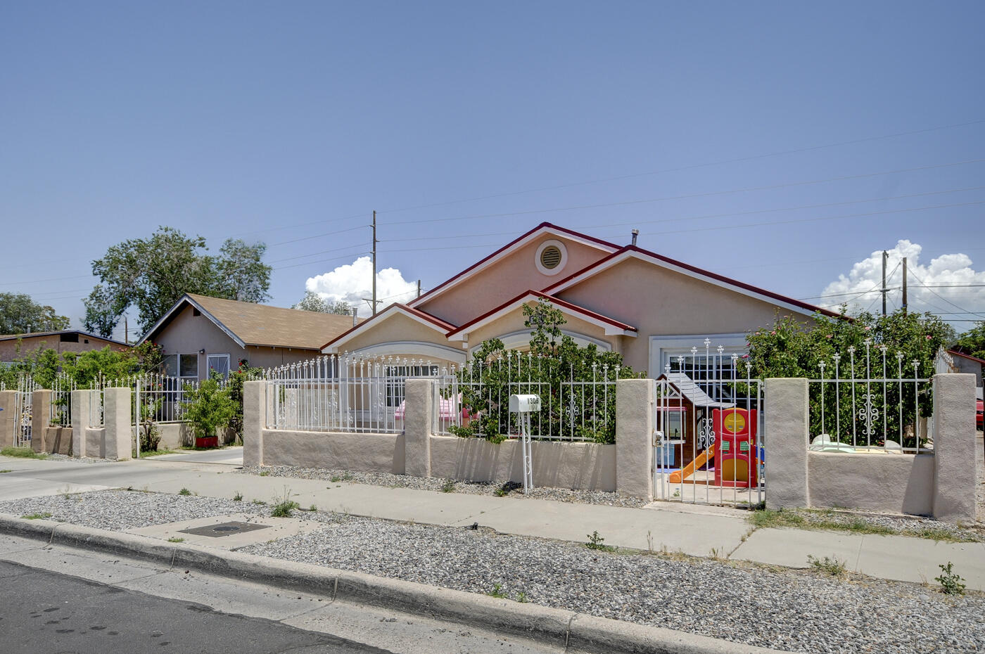 Welcome to this beautiful multi-use property that your buyers will surely love! This is a 4 bed 2 bath gem with an additional structure that can be used as a casita. The casita has its own entrance for privacy. Pride of ownership beams throughout with custom tile, refrigerated air and a large yard. Minutes from freeway, UNM, Downtown and shopping.
