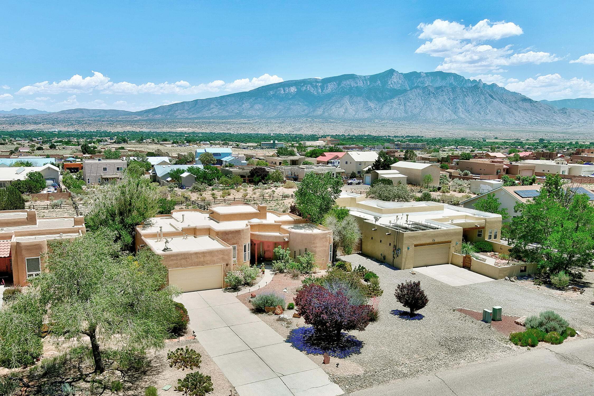 This charming single-story home in Vista Entrada boasts a landscaped half-acre lot w/breathtaking views of the majestic Sandia Mountains right from your backyard. Imagine waking up to the stunning vistas every morning! The TPO roof is just four years young. Enjoy cozy winters w/radiant floor heat & stay cool during the summer months wi/refrigerated air. This home is equipped wi/a central vac system. Step inside to find classic Southwestern touches such as corbels, vigas, and tongue & groove ceilings, adding warmth & character to the space. The kitchen & breakfast nook offer plenty of storage, cabinets w/roll-out shelving, and ample granite counter space for all your cooking adventures. Convenient to shopping, restaurants, golf courses, & entertainment. Easy access to 528 & 550.