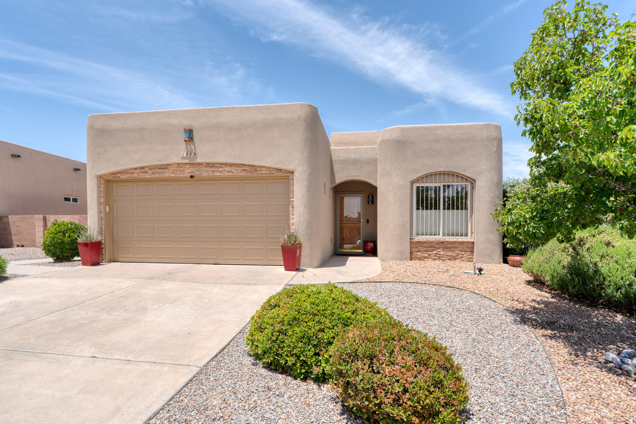 This single story Rio Rancho beauty is move in ready and located in the desirable Trinity estates (next to Intel). Walk in and enjoy the functional floorplan that offers 3 Bedrooms and 2 full bathrooms! The home offers, viga ceilings, a fireplace, granite counter tops, large double ovens and a gas cooktop! The private backyard is fully walled in with grass and a large covered patio! This property has a newer TPO roof and garage door (2018), New AC, New water Heater and all New water supply lines (PEX)! Call your favorite Realtor today to set up your own private showing!