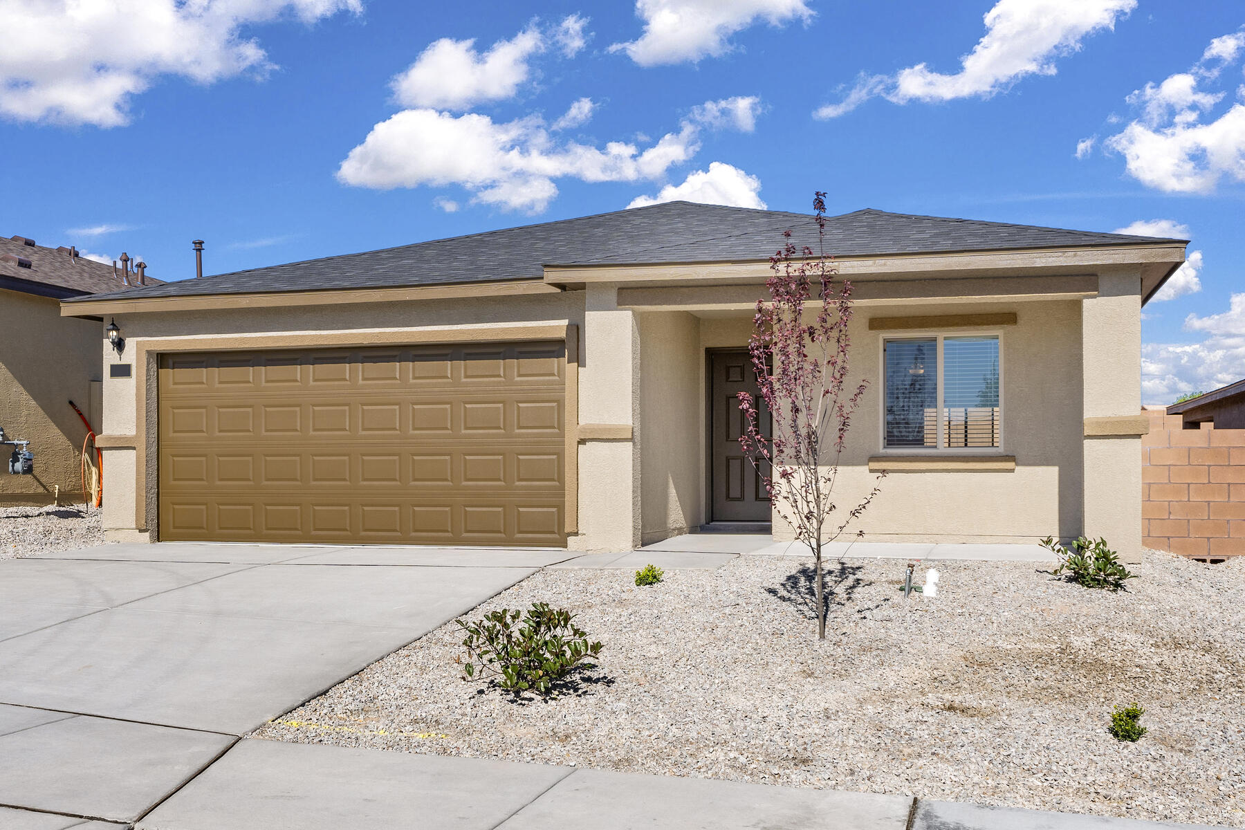 The three-bedroom Bisbee floor plan stands out with its open living spaces, perfectly suited for family life. Seamlessly integrating the stunning kitchen, dining area, and family room, the open-concept layout is ideal for gatherings. Nestled away from the other bedrooms, the master suite offers privacy and tranquility, and the covered back patio extends relaxation to the outdoors. Additionally, the CompleteHome(tm) package enhances living with state-of-the-art appliances, granite countertops, wood-style flooring, and a two-car garage for elevated family living.