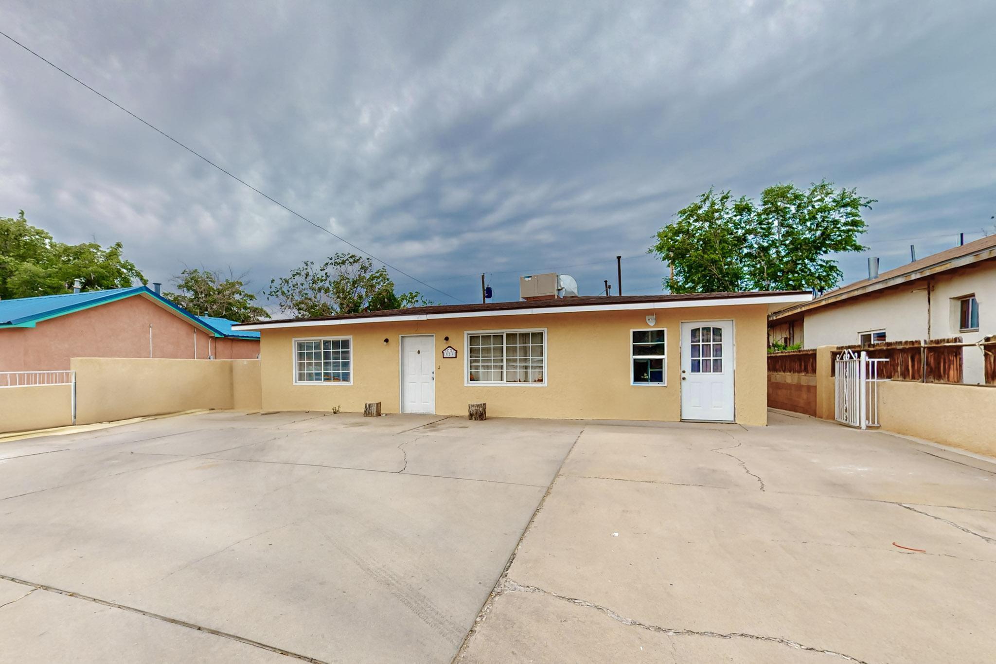 This charming 2 bedroom, 1 bathroom residence. Great income producing investment both currently rented. This is a great house with a separated casita in the back, which also has 2 bedroom, 1 bathroom with refrigerated air. Home is walled front and back.