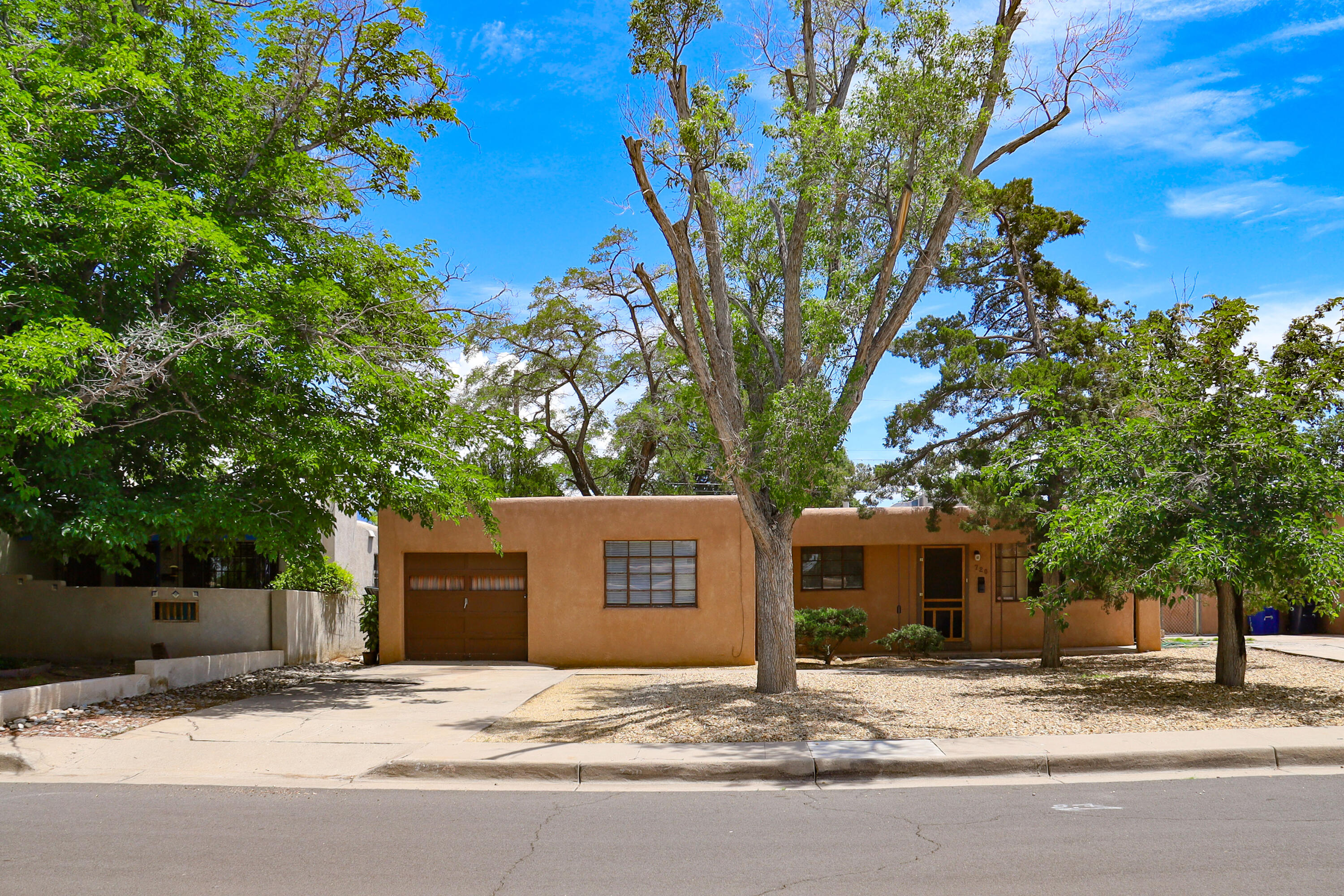 Built in the timeless 1950s. Original hardwood floors greet you as you enter the living/dining room area.  Freshly painted throughout,  new Luxury Vinyl Planking in the kitchen and bath areas.  Flex room would make a nice den, home gym or office.  Mature landscaping.  Walled backyard for privacy.  Check it out...you will love it!