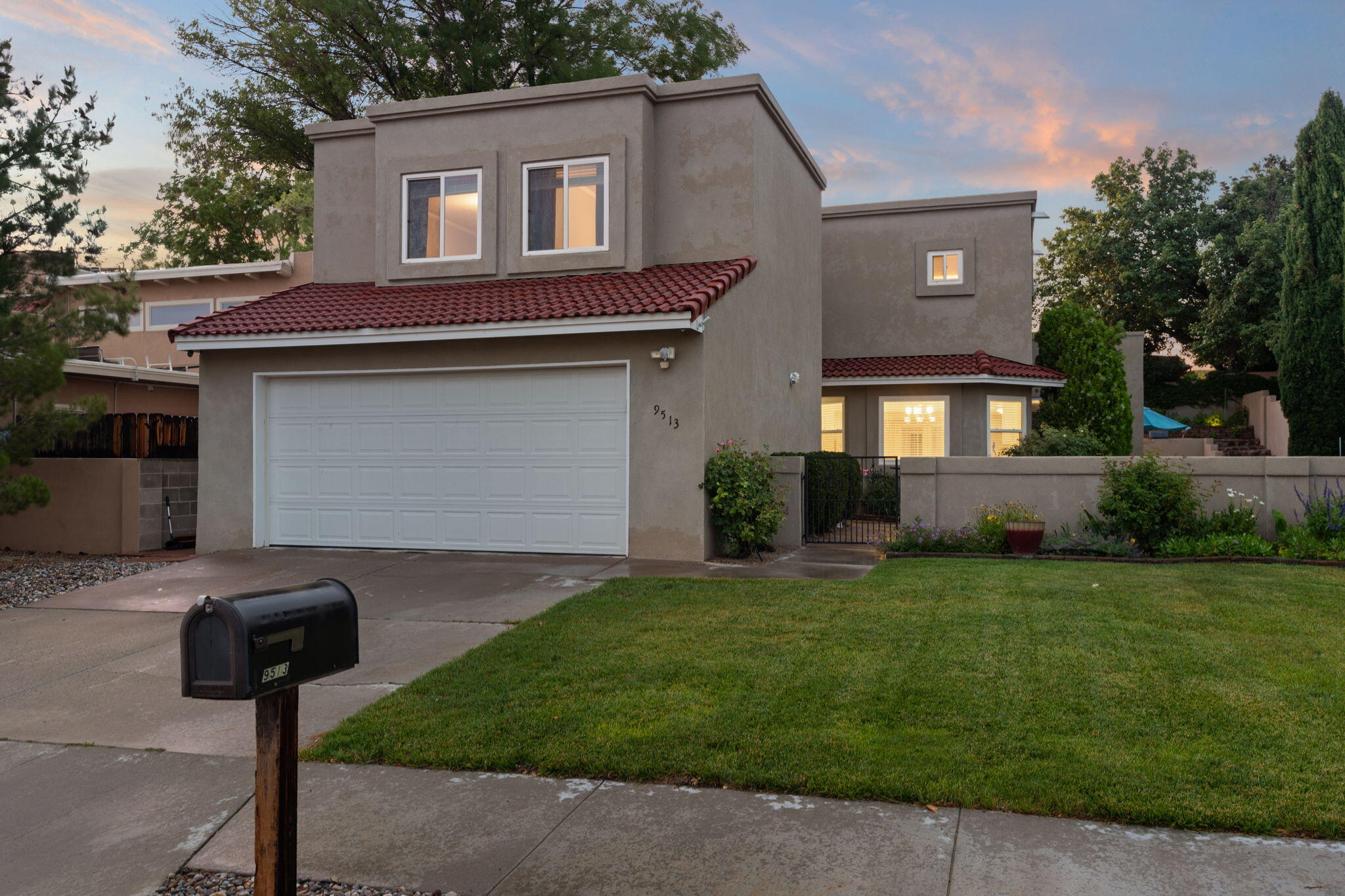 Welcome Home! This home has been very well maintained. The following items have been upgraded- Kitchen remodel, Primary bedroom tub/shower area, newer windows, (roof 2023)This home is beautifully landscaped, with a front courtyard that wraps around to the tiered backyard. The floor plan allows for indoor/outdoor entertaining. HUGE/Open kitchen with an amazing amount of storage and counter space. for large family gatherings. Solid surface flooring downstairs, with wood fireplace and 2 large patio doors off of the kitchen Large Primary Bedroom, with walk in closet, wood fireplace, upgraded carpeting and deck. The home is very light, bright, crisp, and clean  throughout.Excellent location to Public/Private schools, medical and fine dining.