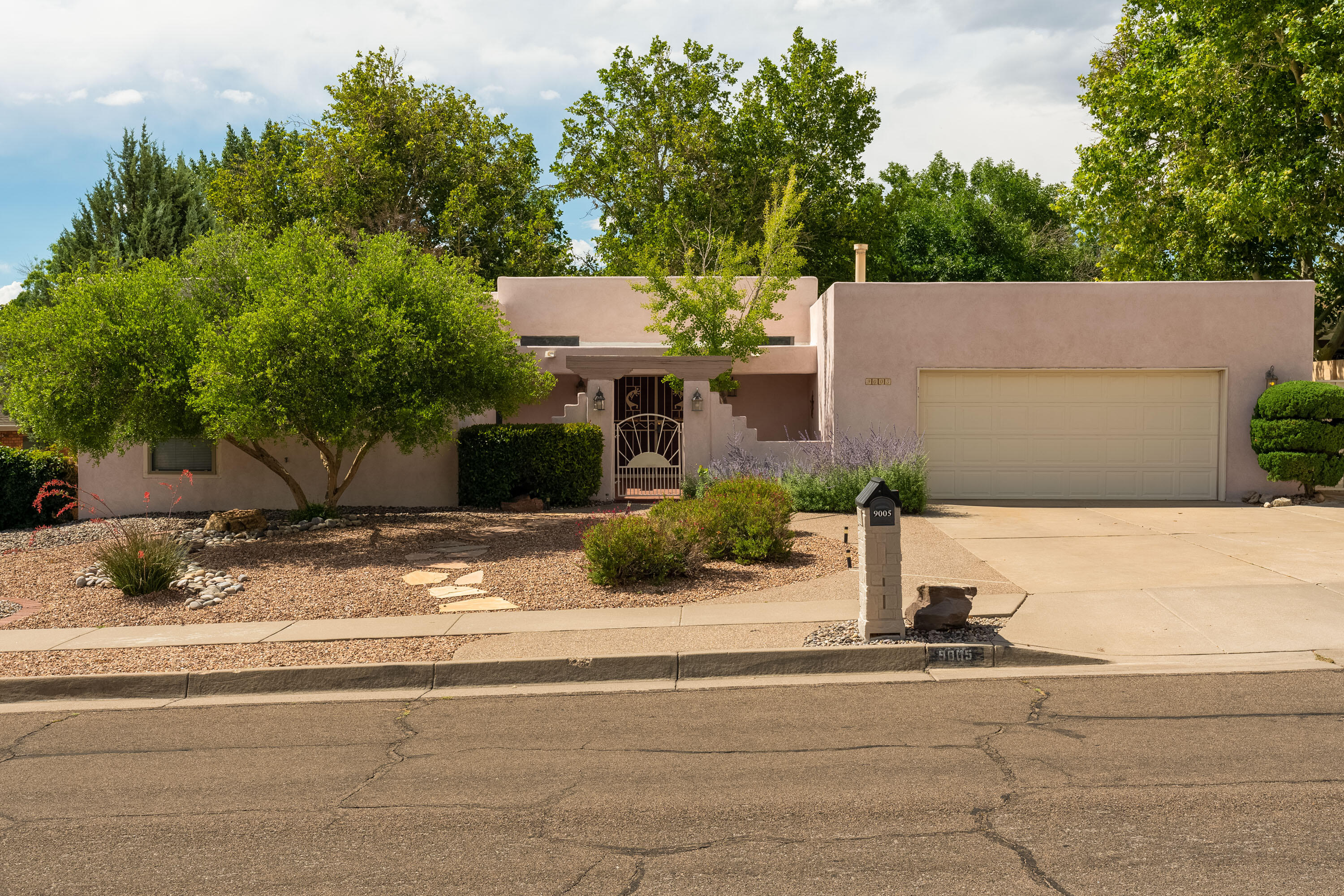 Welcome to this beautiful Academy Estates home! This open and well thought out floor plan provides ample space for everyone to spread out. The kitchen has been tastefully updated, including granite counter tops and stainless steel appliances. Enjoy a well manicured backyard from multiple access points and seating areas. The beautiful mountain views and side yard access includes full RV hooks ups. To top this all off, this great home has a newer TPO roof (2021), complete re-stucco of home (2024) and thermal commercial grade aluminum windows. You don't want to miss this gem in a highly coveted neighborhood!