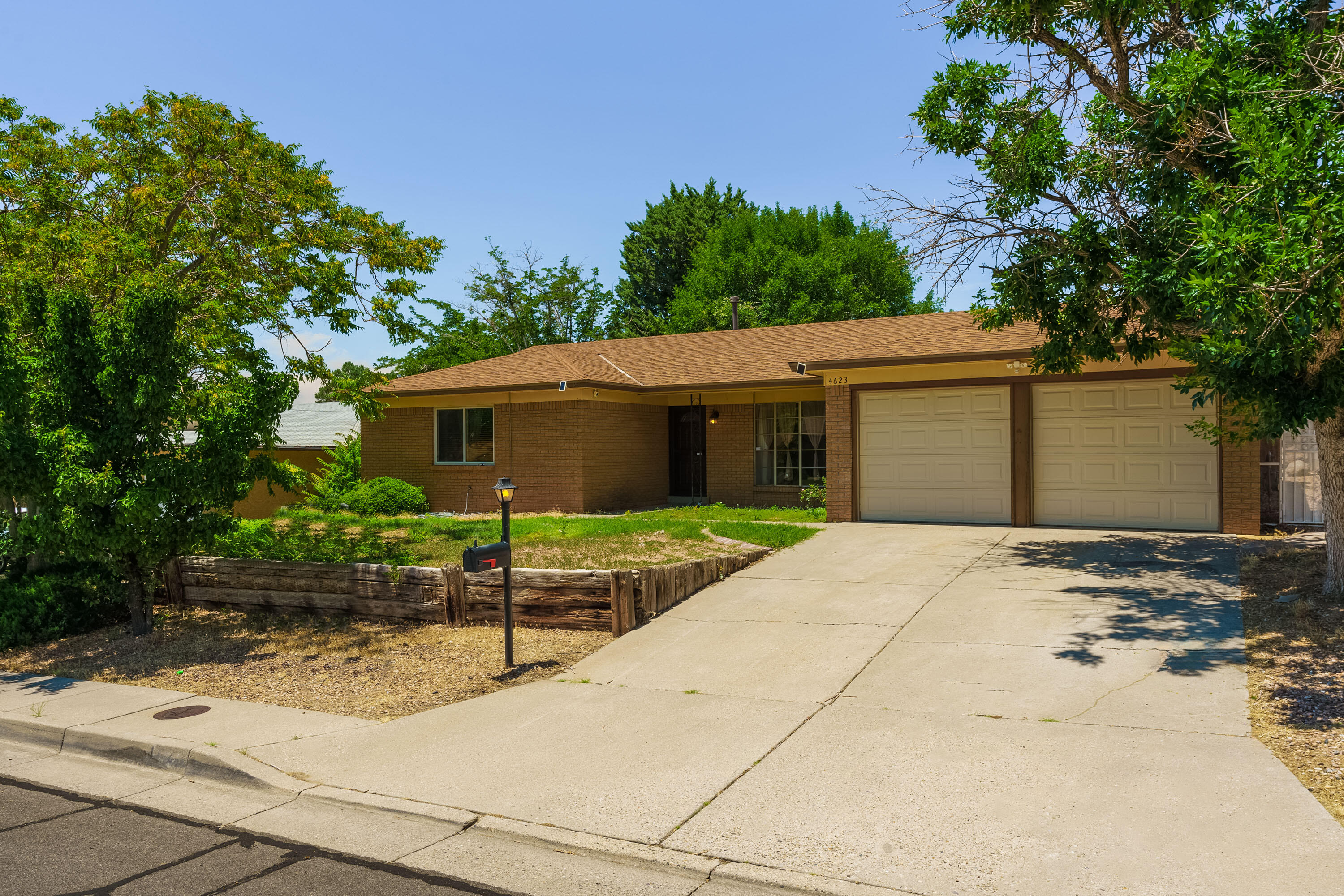 Discover this beautifully maintained home in the desirable NE Heights neighborhood. Featuring newer flooring  in most of the home and a less than 5 year old roof and A/C unit. This residence offers a fresh and warm feel. Enjoy stunning mountain views looking out the front yard and relax from the comfort of your spacious patio in the backyard, perfect for outdoor relaxation. The well-kept backyard provides a serene escape for gatherings or quiet moments. This inviting home combines comfort and style in a prime location--don't miss out on the opportunity to make it yours!