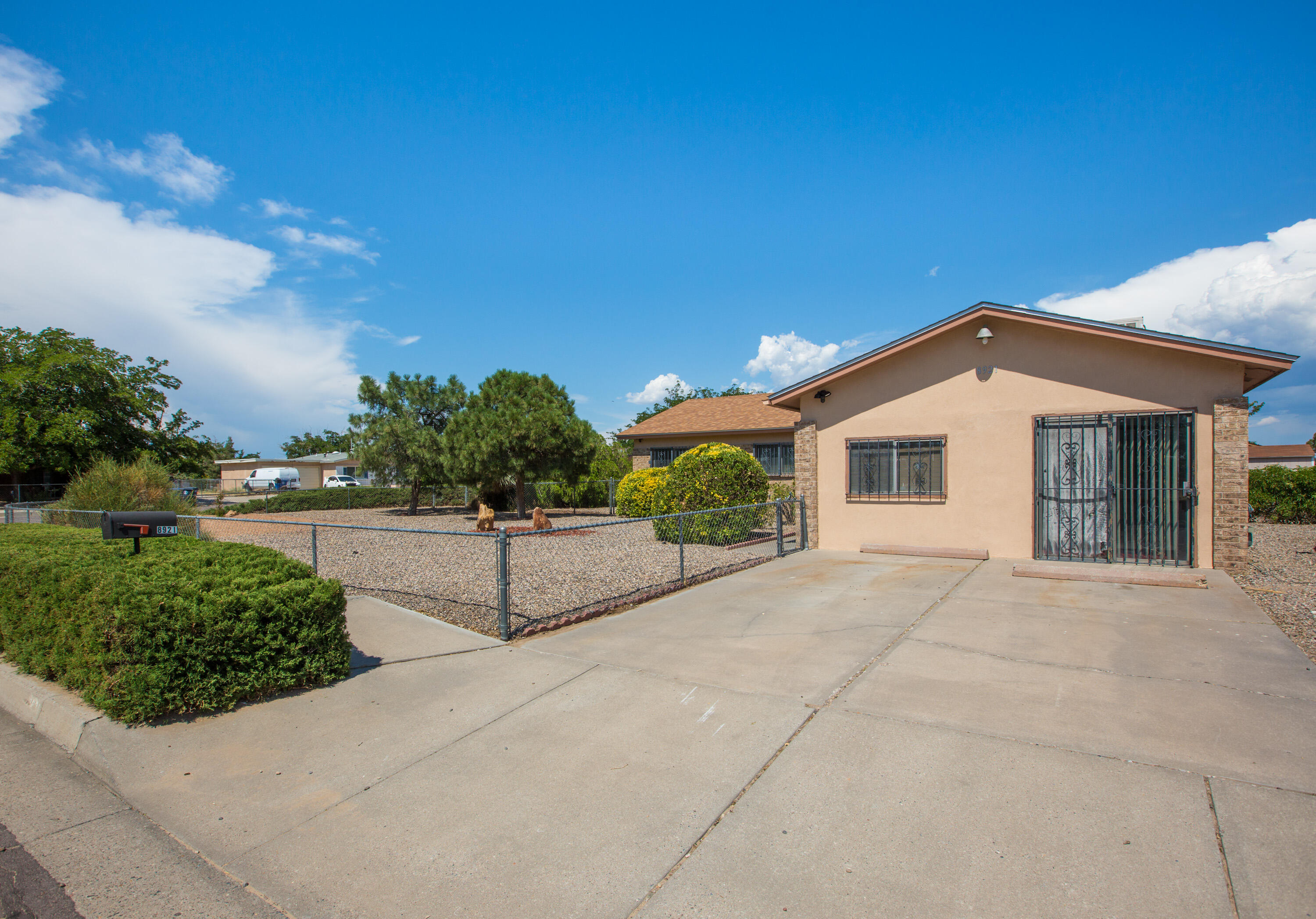 This Southwest Heights beauty boasts a huge corner lot in the heart of Westgate. Meticulously maintained, this charming 3-bedroom, 2-bath home exudes pride of ownership. Featuring two spacious living areas, a bright kitchen with stainless steel appliances, and well-sized bedrooms, it's perfect for entertaining. The vast backyard with a covered patio and two sheds provides ample space for outdoor activities. Located near schools, parks, and shopping, this home offers superb value and move-in-ready convenience.