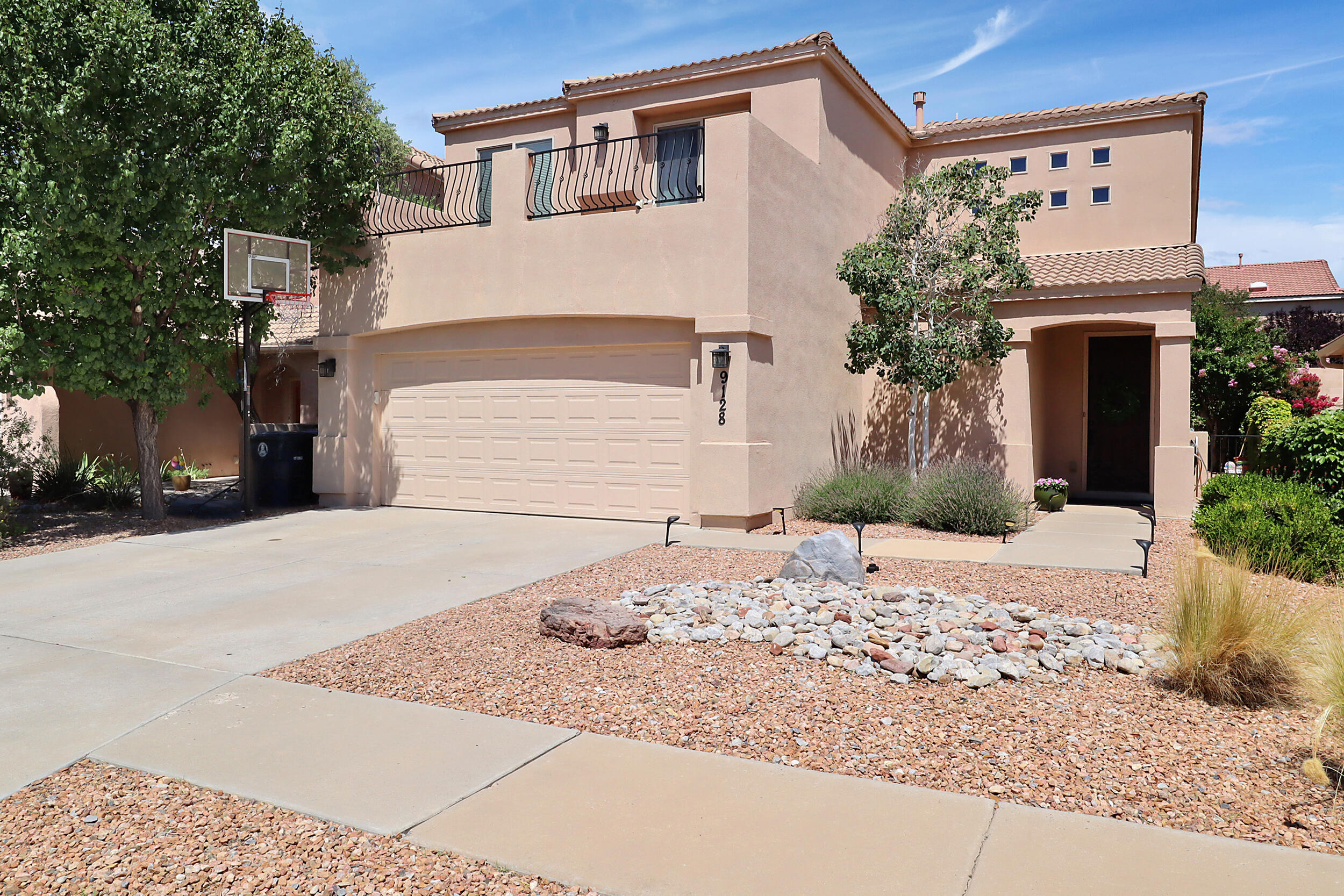 This incredible home has been kept in pristine condition. Well loved this property is brimming with updates. Natural lighting makes this home bright & cheery. Two spacious living areas are perfect for entertaining. Beautiful custom kitchen features Cambria quartz countertops, custom cabinetry, pull out pantry, Blanco Granite composite sink and newer appliances. Oversized primary suite is a serene retreat w/2 walk in closets & sitting deck. Ensuite bath features garden tub, separate shower, his/her sinks. Large guest room may serve as office/workout space with front facing deck. Private backyard offers a tranquil oasis, meticulously landscaped, low maintenance with covered patio, water feature and hot tub.