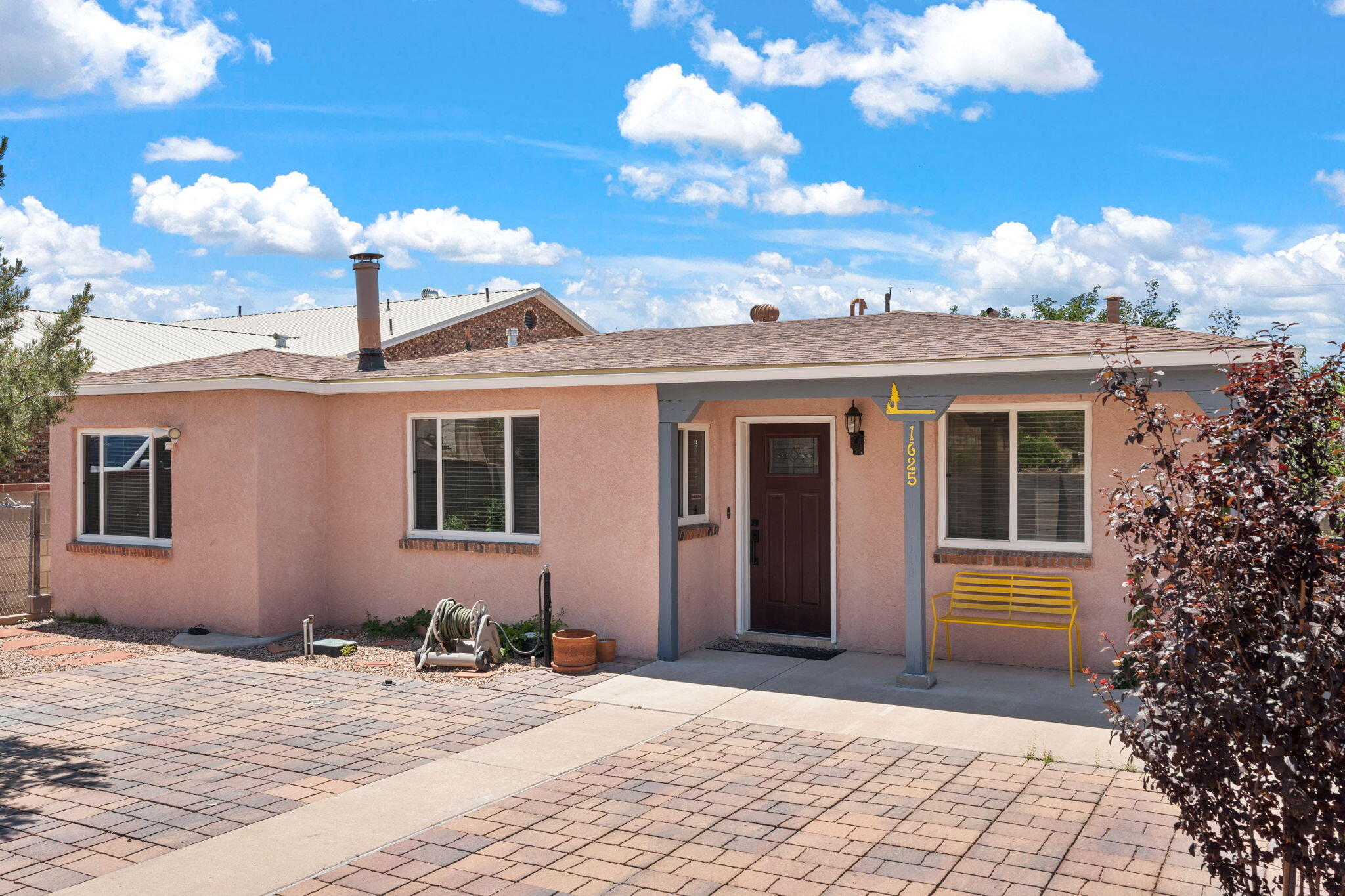 A wonderful opportunity to own a home in the UNM area with an oversized(extra lot)lot. Room for a casita, tiny home, or another home, RV, options are limitless. This move-in ready home has been renovated and modernized to include, kitchen, bathrooms, flooring, lighting and freshly painted throughout. Refrigerated Air! Courtyard entry and a wonderful patio off the back of the home, room for dining al fresco, entertaining and views to the west. Property fenced and provides privacy. Room for 10 plus cars. near Kirtland air Force base, golf course, UNM and easy access to I25. GEM and a must see!