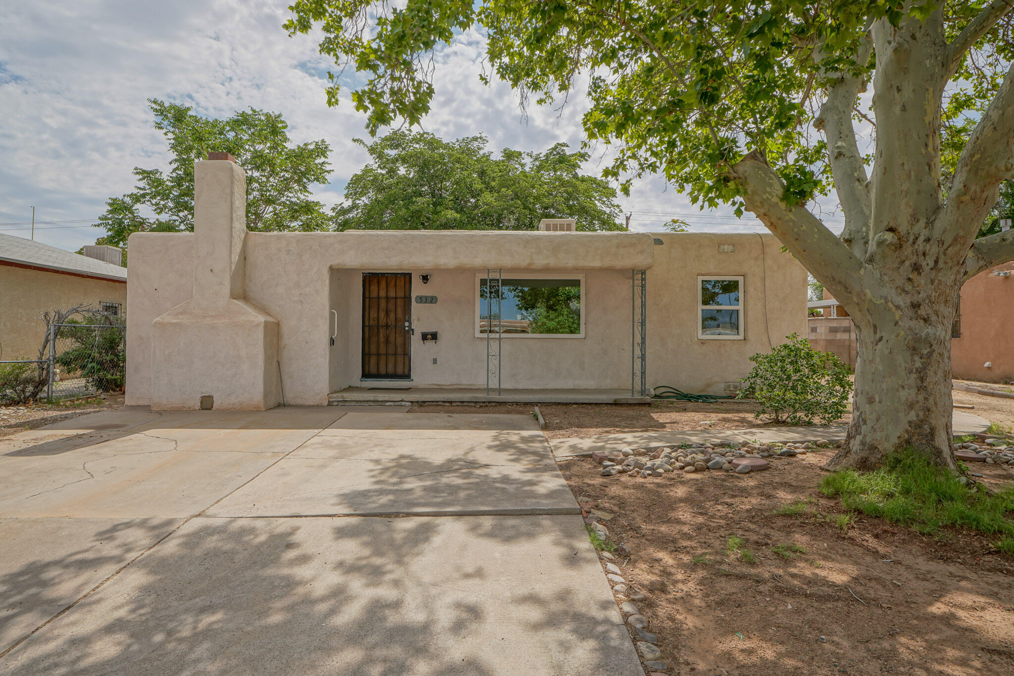 Welcome to 532 Arizona St SE! Built in 1962, this 1504 sqft home with an attached 470 sqft mother-in-law suite/apartment offers endless potential. The main house features 3 bedrooms and 2 full baths, while the suite includes a separate kitchen, full bath, bedroom with walk-in closet, and living room. Recent updates include fresh paint, new carpet, a brand-new furnace, and replaced plumbing. The roof and A/C are in great condition. With alleyway backyard access, this property is perfect for rentals or a starter home. Solid and well-maintained, it's priced and ready for your personal touch!