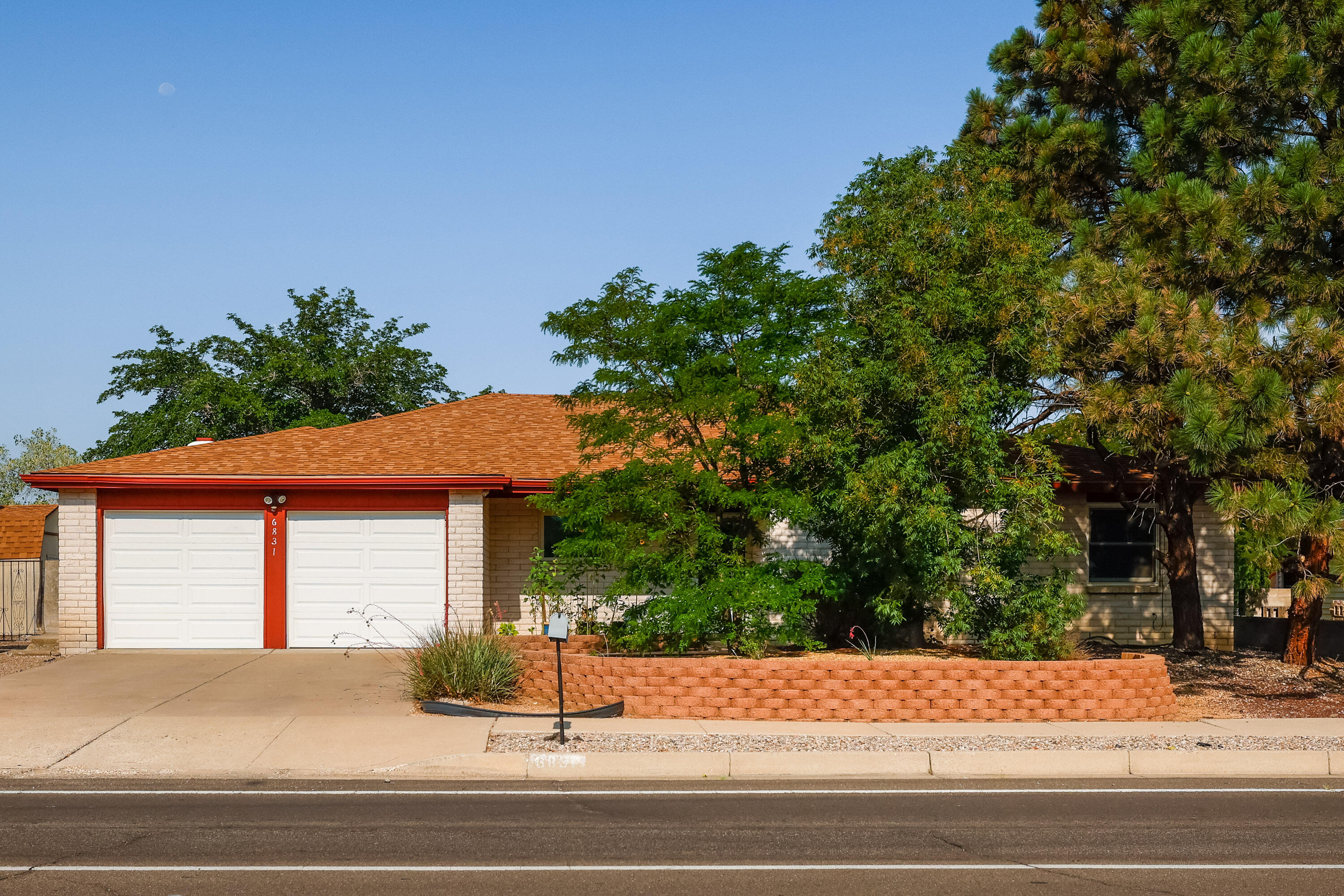 Come see this lovely 4 bedroom, 2 living areas, REFRIGERATED AIR home on a large, corner lot in the perfect location! New roof and carpet 2021, new water heater 2017. This home has been loved and cared for, and is move in ready for its next owners. Don't miss your opportunity!